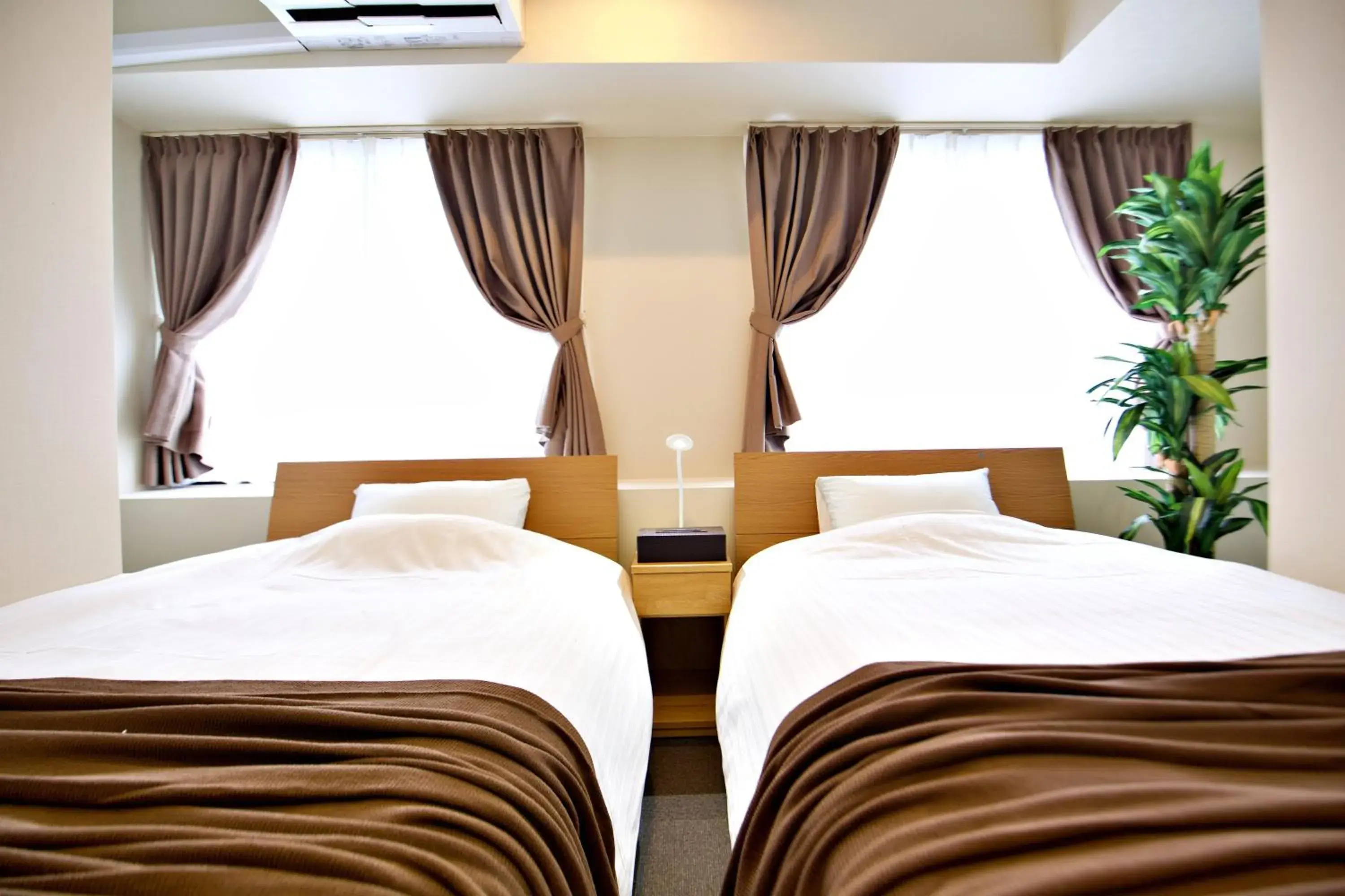 Bed in KURA HOTEL IZUMISANO Bed in KURA HOTEL IZUMISANO