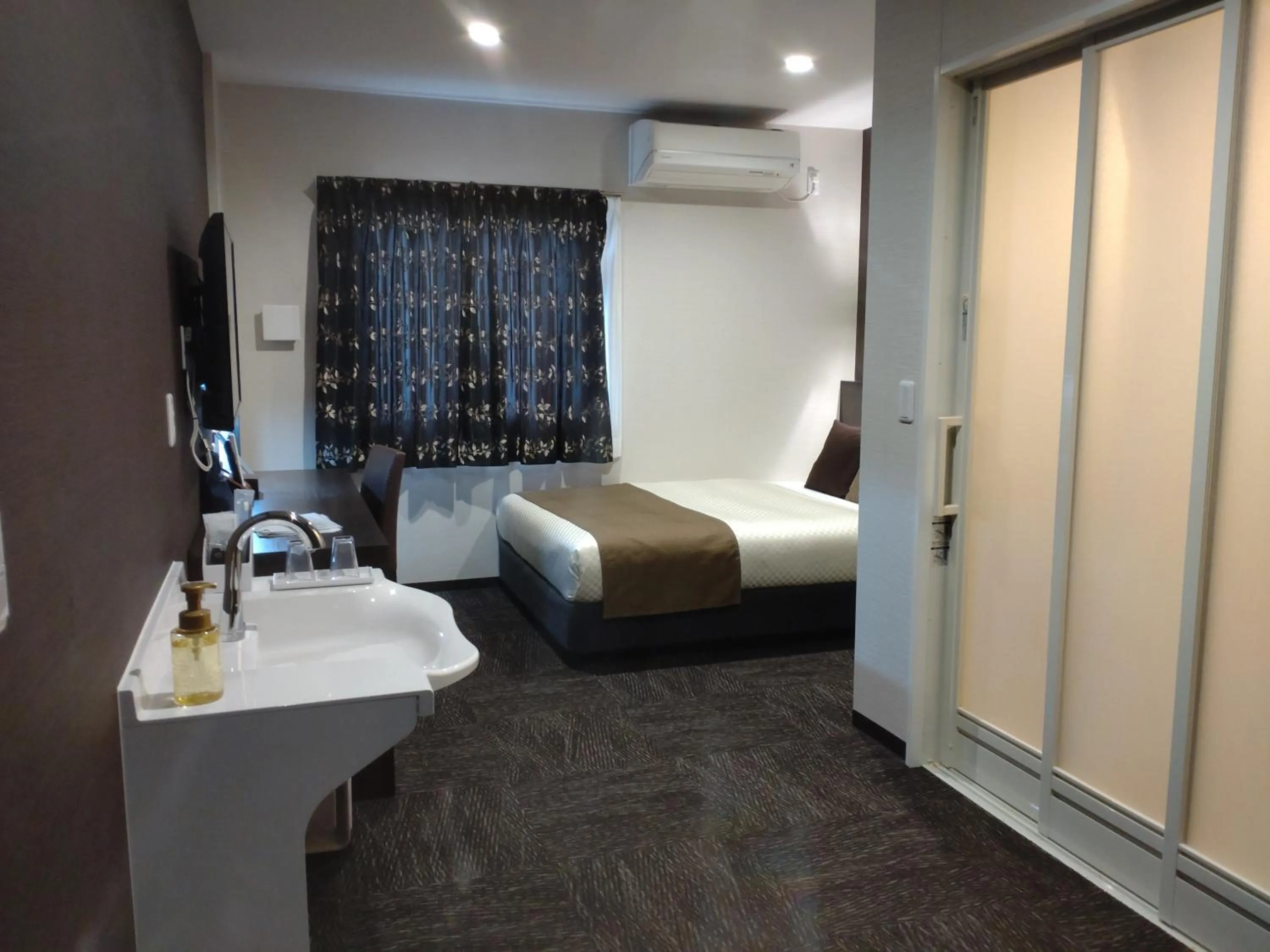 Bed in The Celecton Omiya Kaisoku Kitamoto Ekimae