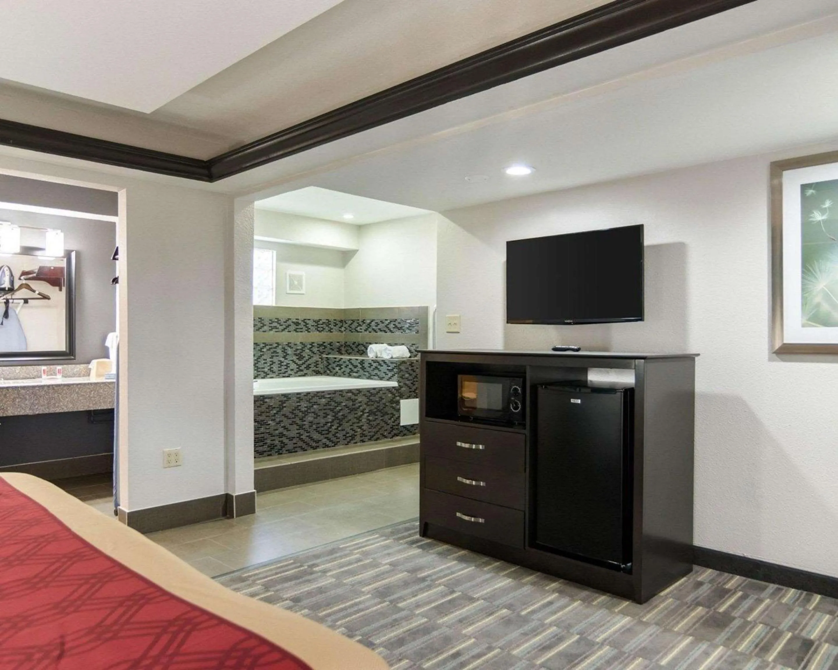 Bedroom in HomeStay Inn & Suites