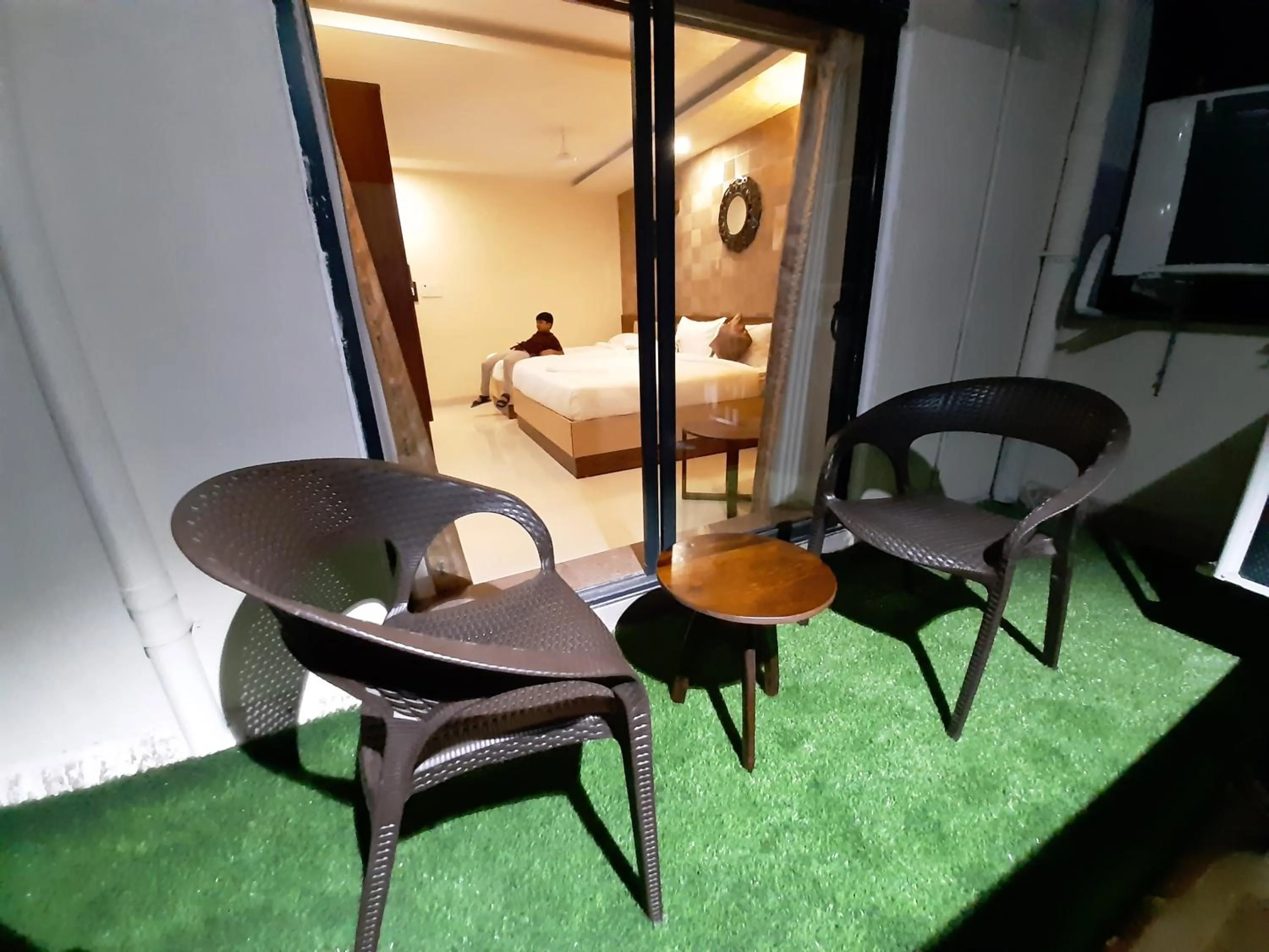 Balcony/Terrace, Bed in Liza Regency