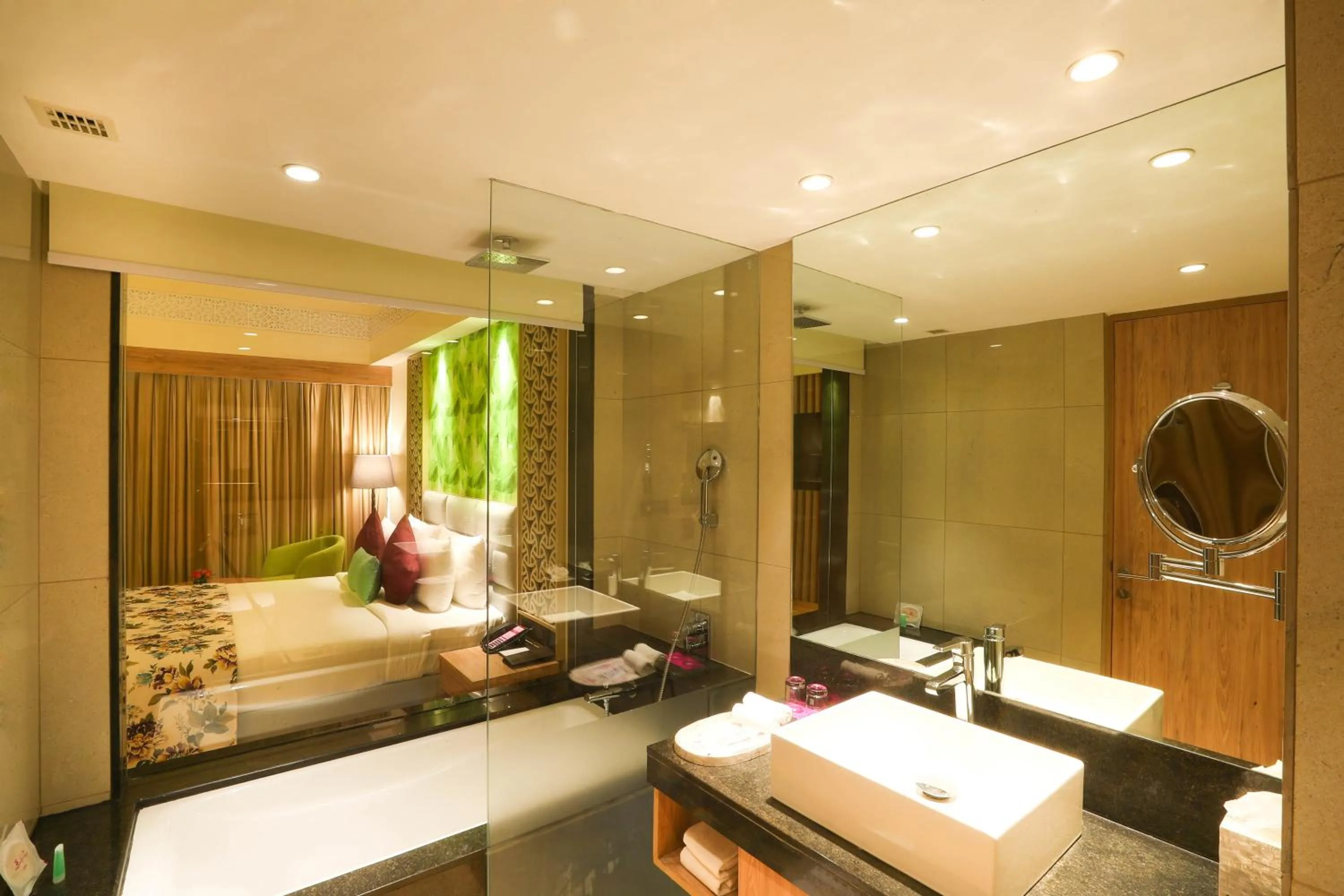 Bathroom, Bed in Regenta Resort Belagavi