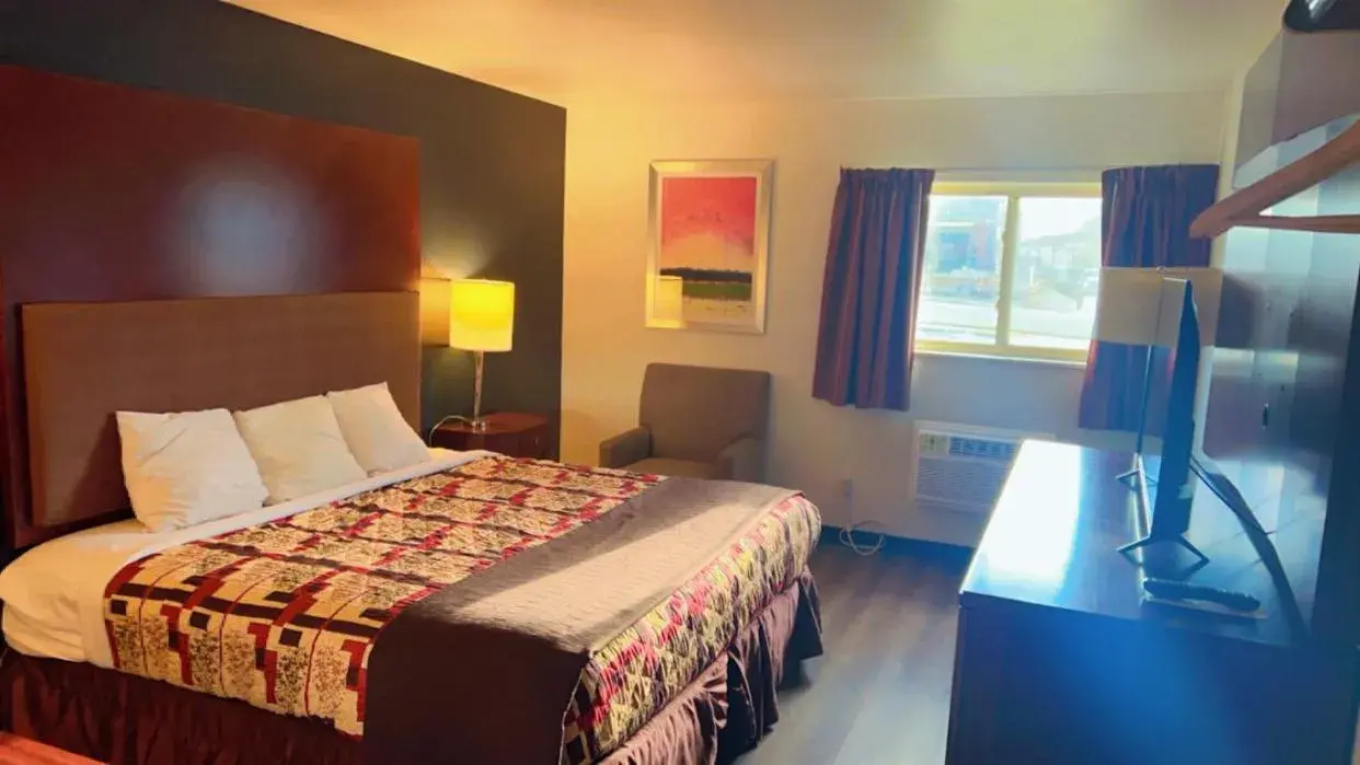 Bed in Rodeway Inn Bed in Rodeway Inn