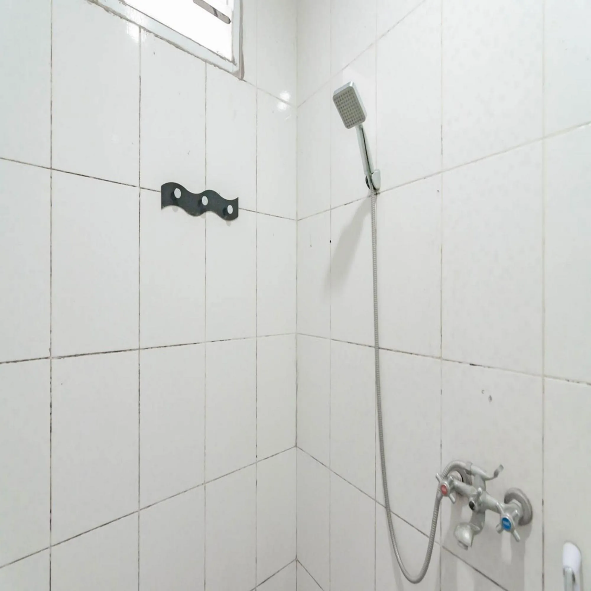 Bathroom in RedDoorz near Trans Studio Mall Bongo Residence