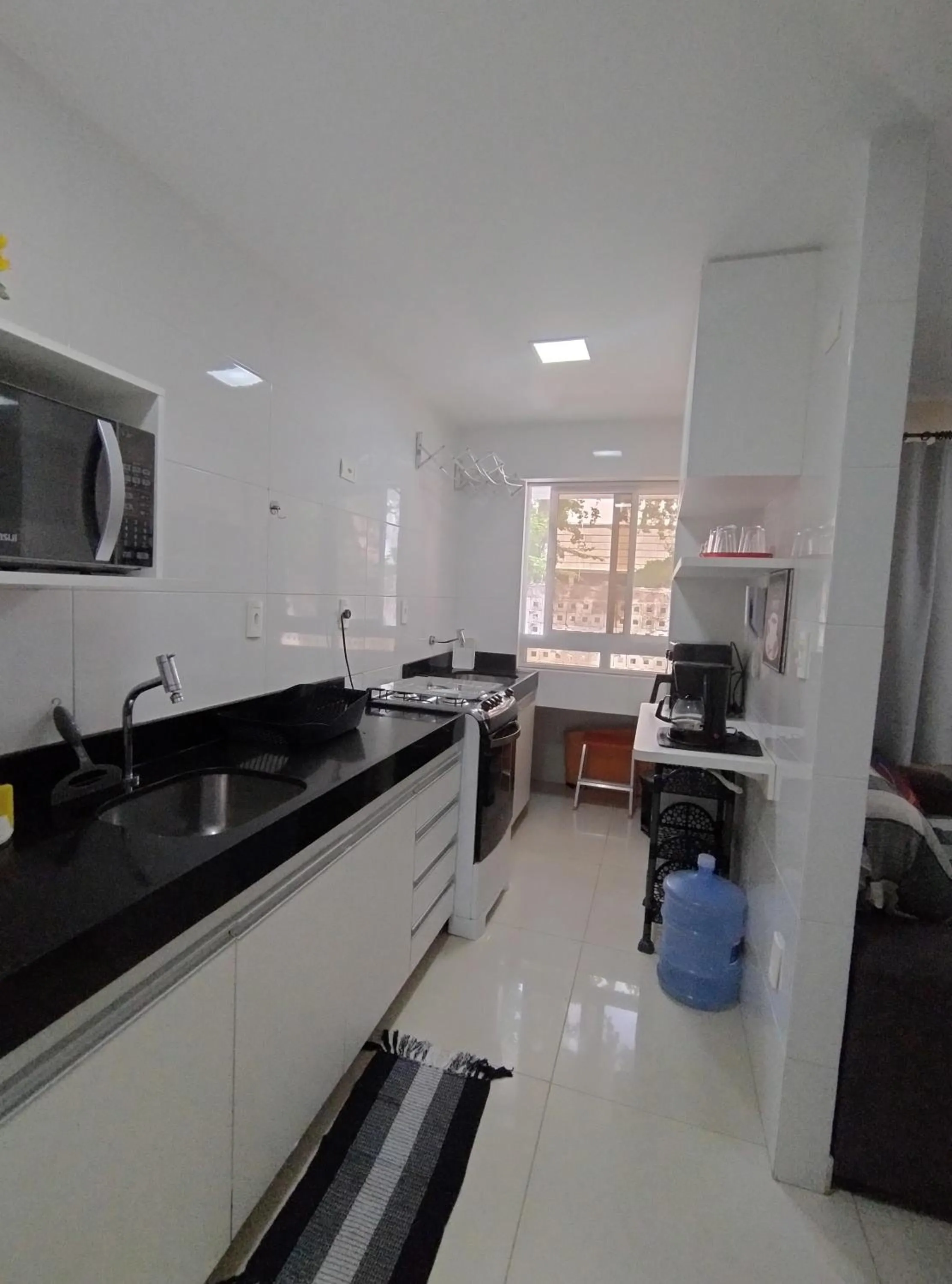 Kitchen or kitchenette in Flat beira-mar TAMBAÚ