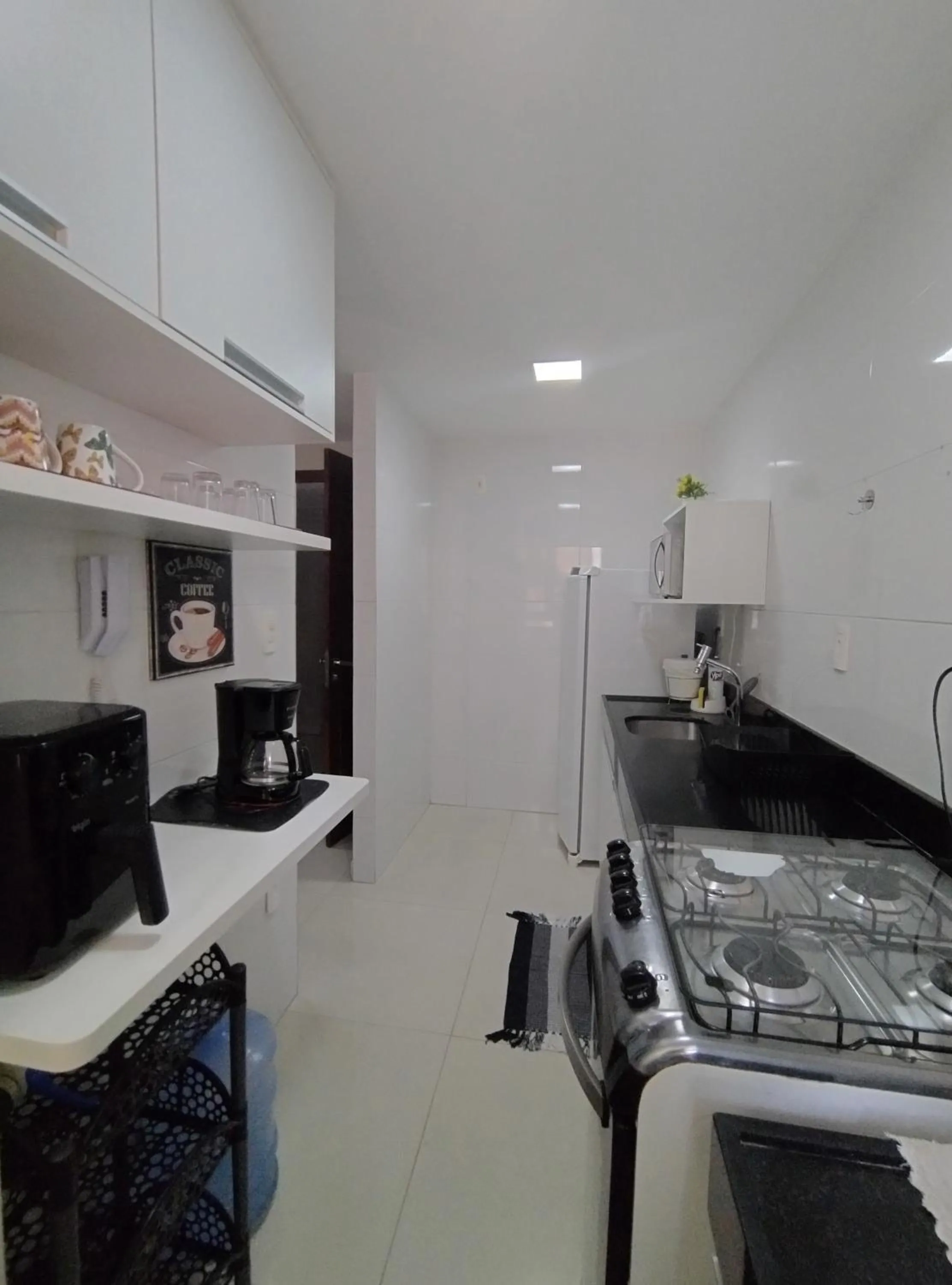 Kitchen or kitchenette in Flat beira-mar TAMBAÚ