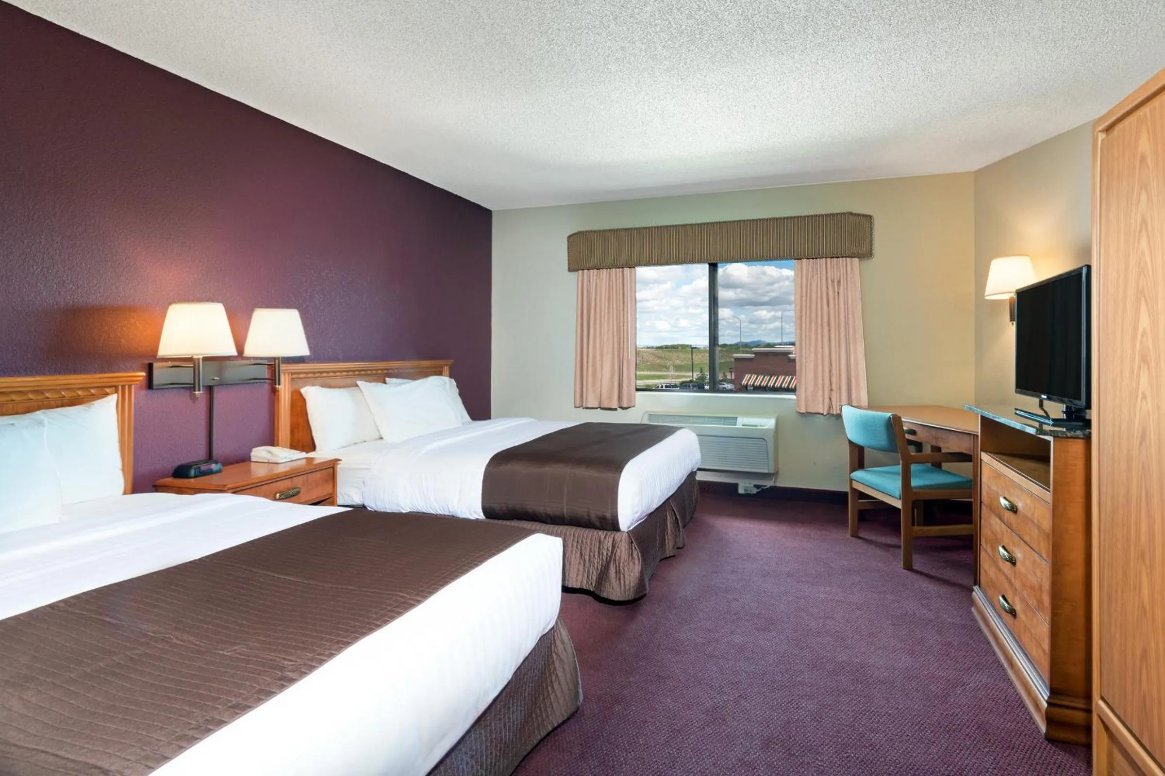 Photo of the whole room, Bed in AmericInn by Wyndham Rexburg BYUI