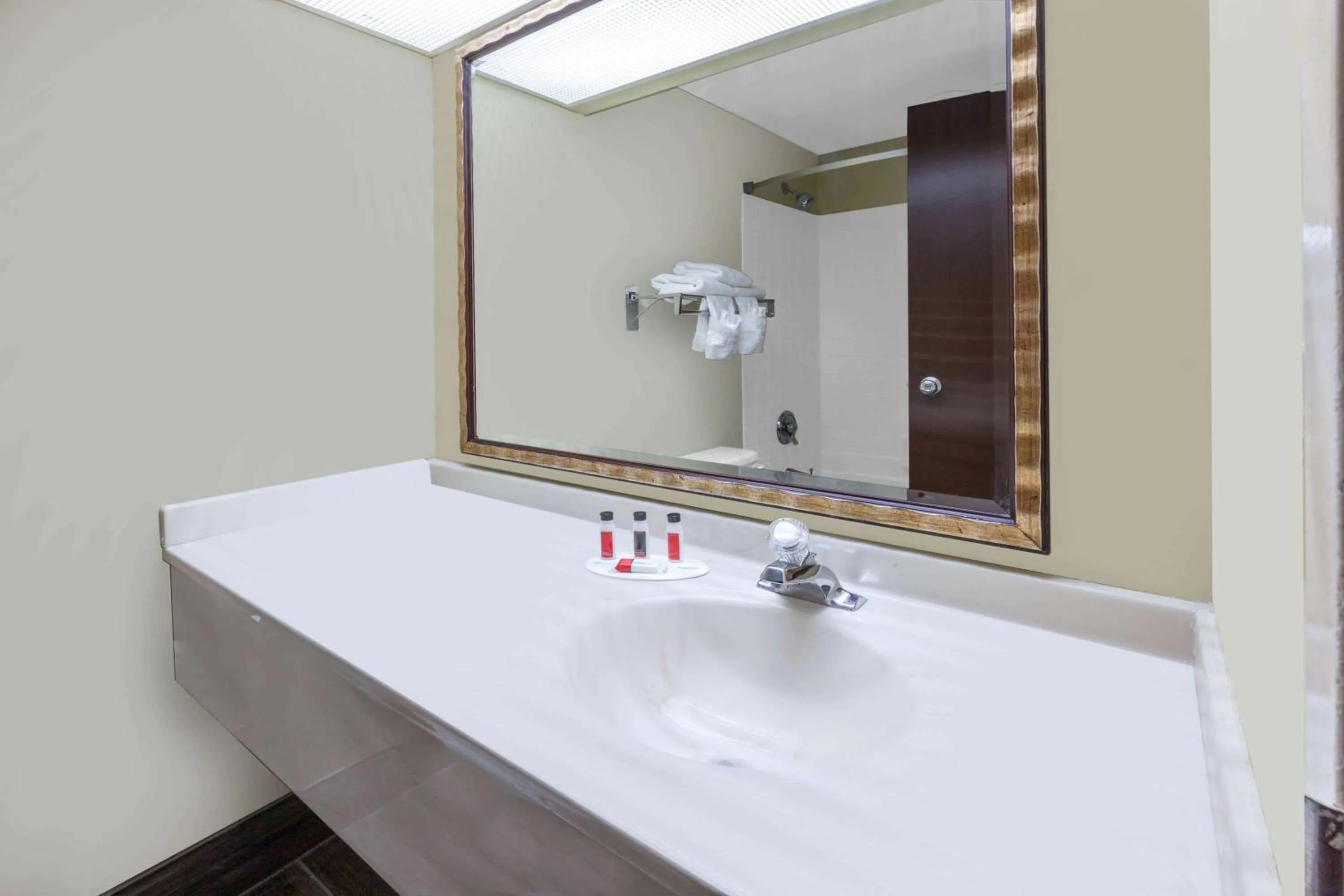 Bathroom in Days Inn by Wyndham Milan Sandusky South