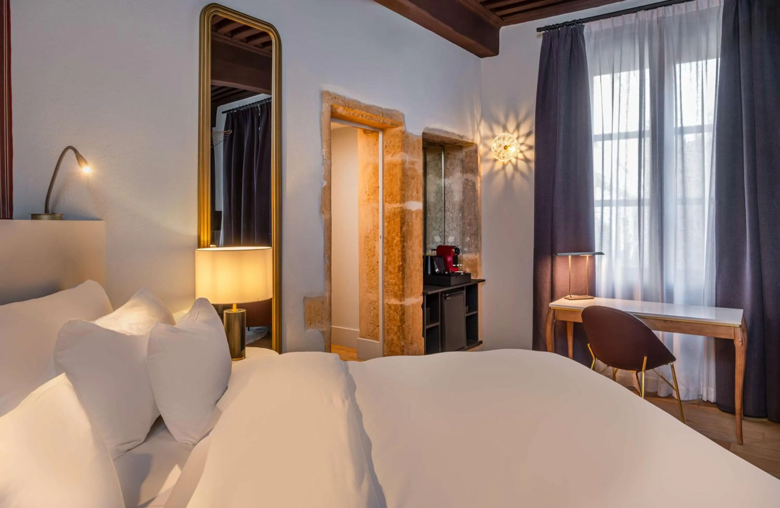 Photo of the whole room, Bed in Cour des Loges Lyon, A Radisson Collection Hotel