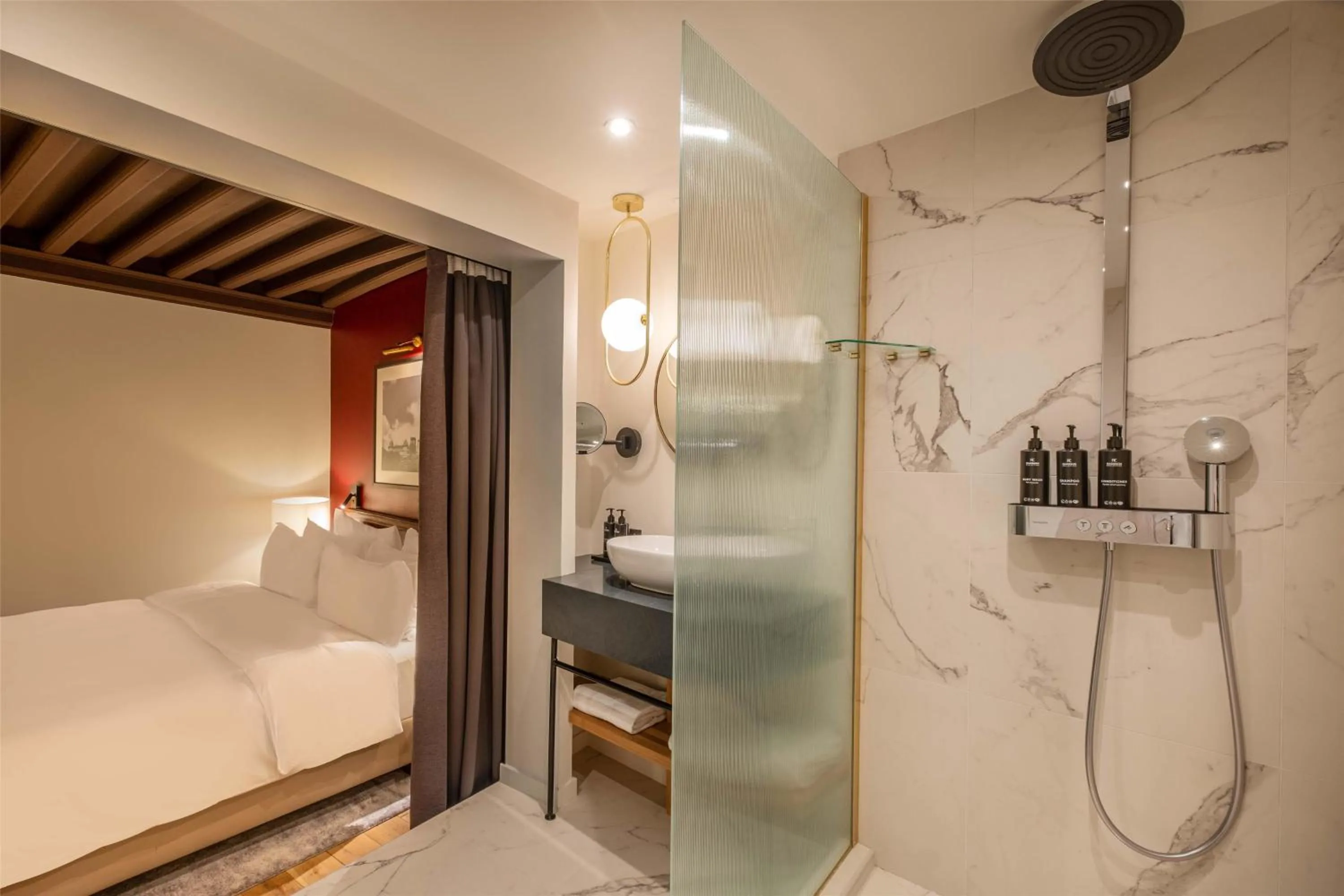 Bathroom, Bed in Cour des Loges Lyon, A Radisson Collection Hotel