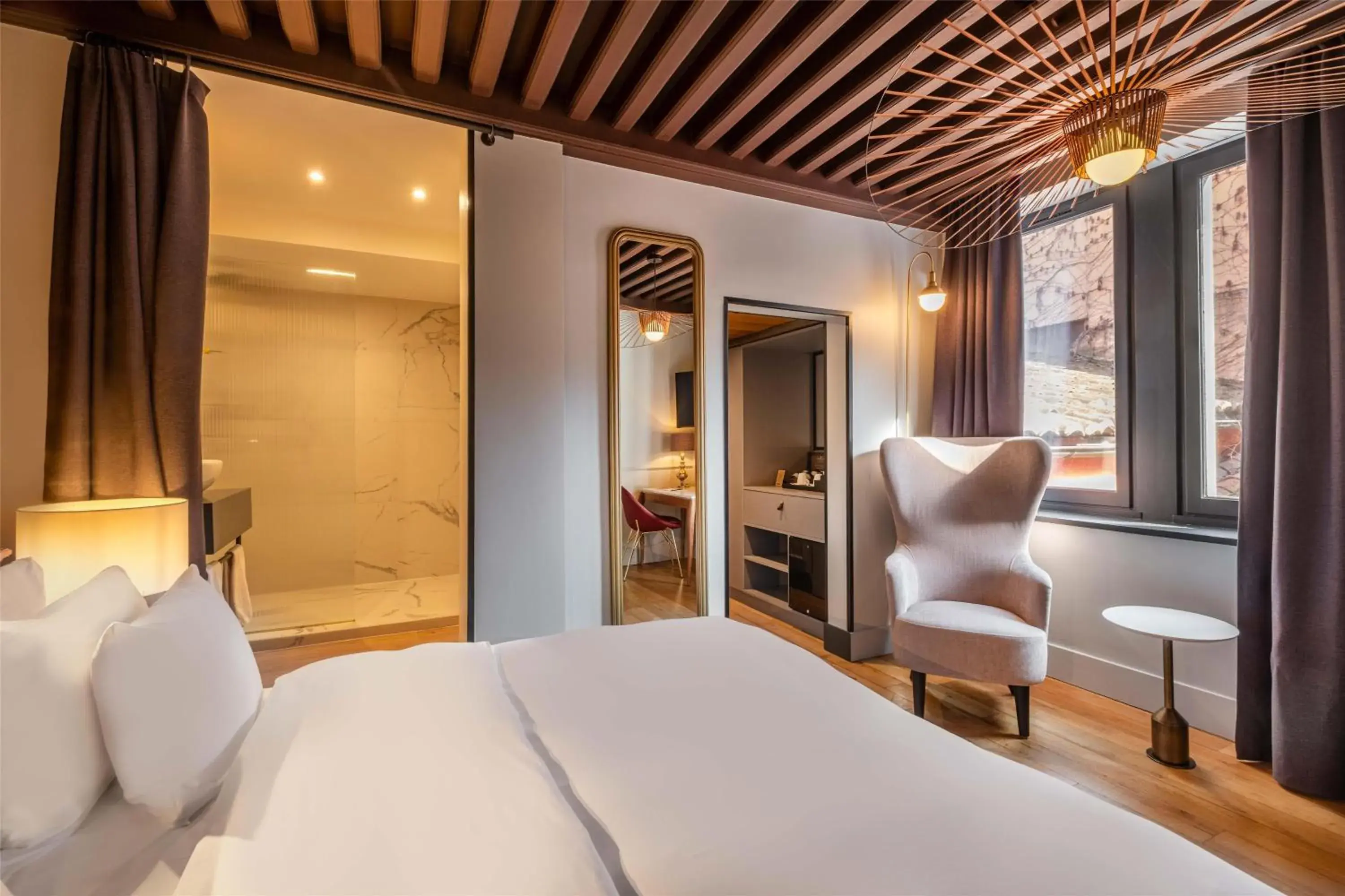 Bedroom, Bed in Cour des Loges Lyon, A Radisson Collection Hotel Bedroom, Bed in Cour des Loges Lyon, A Radisson Collection Hotel