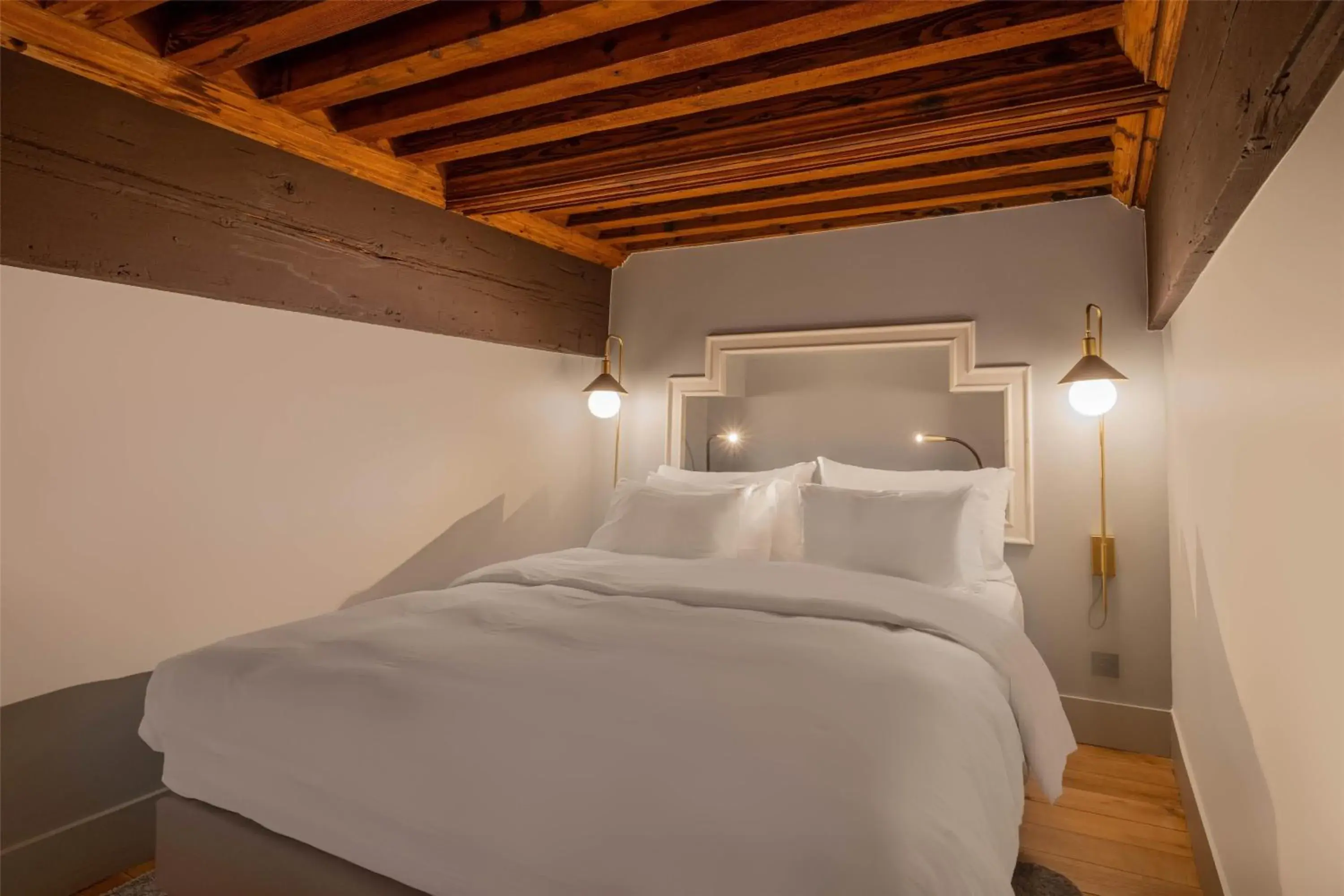 Bedroom, Bed in Cour des Loges Lyon, A Radisson Collection Hotel Bedroom, Bed in Cour des Loges Lyon, A Radisson Collection Hotel