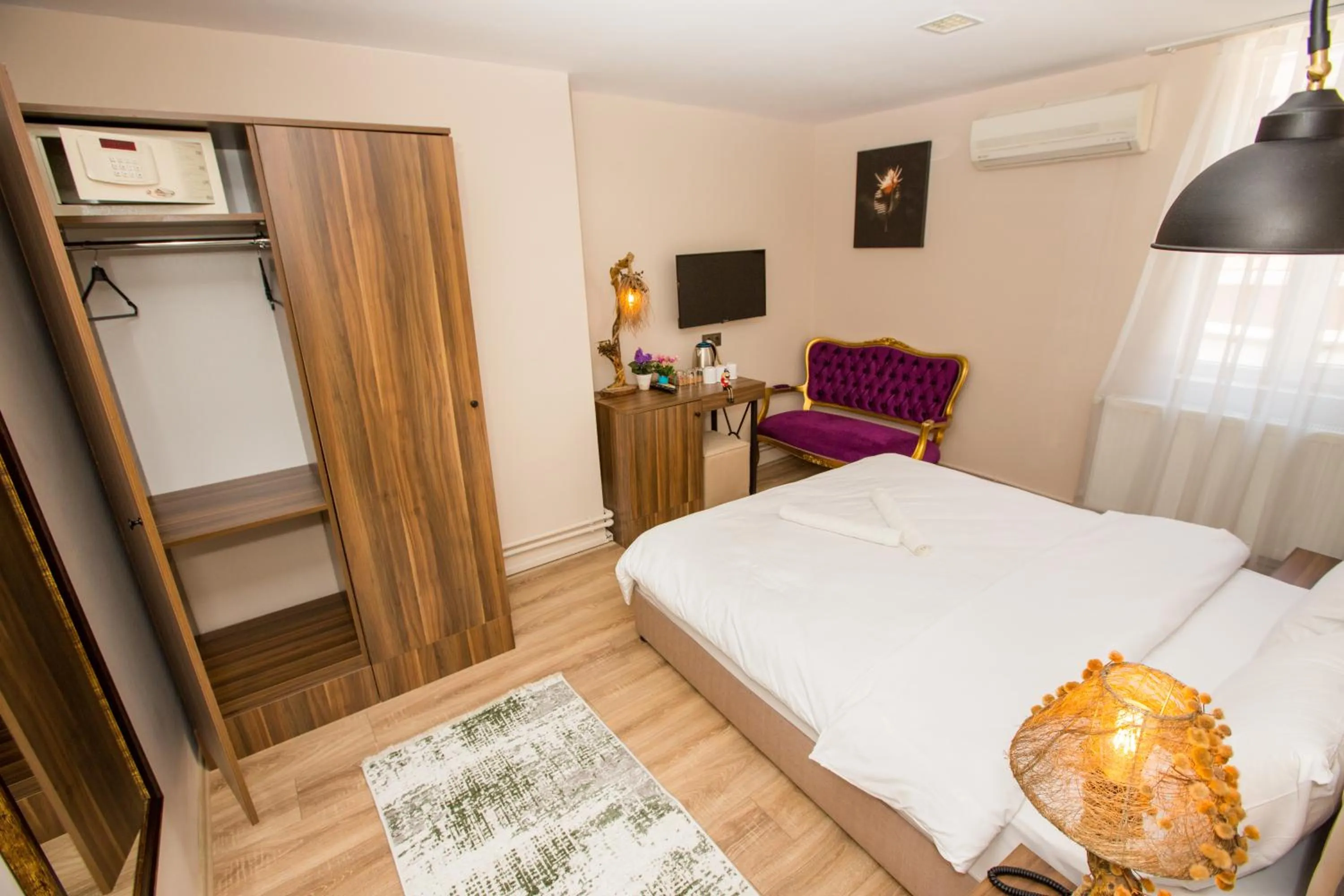 Bed in Corner Garden Hotel