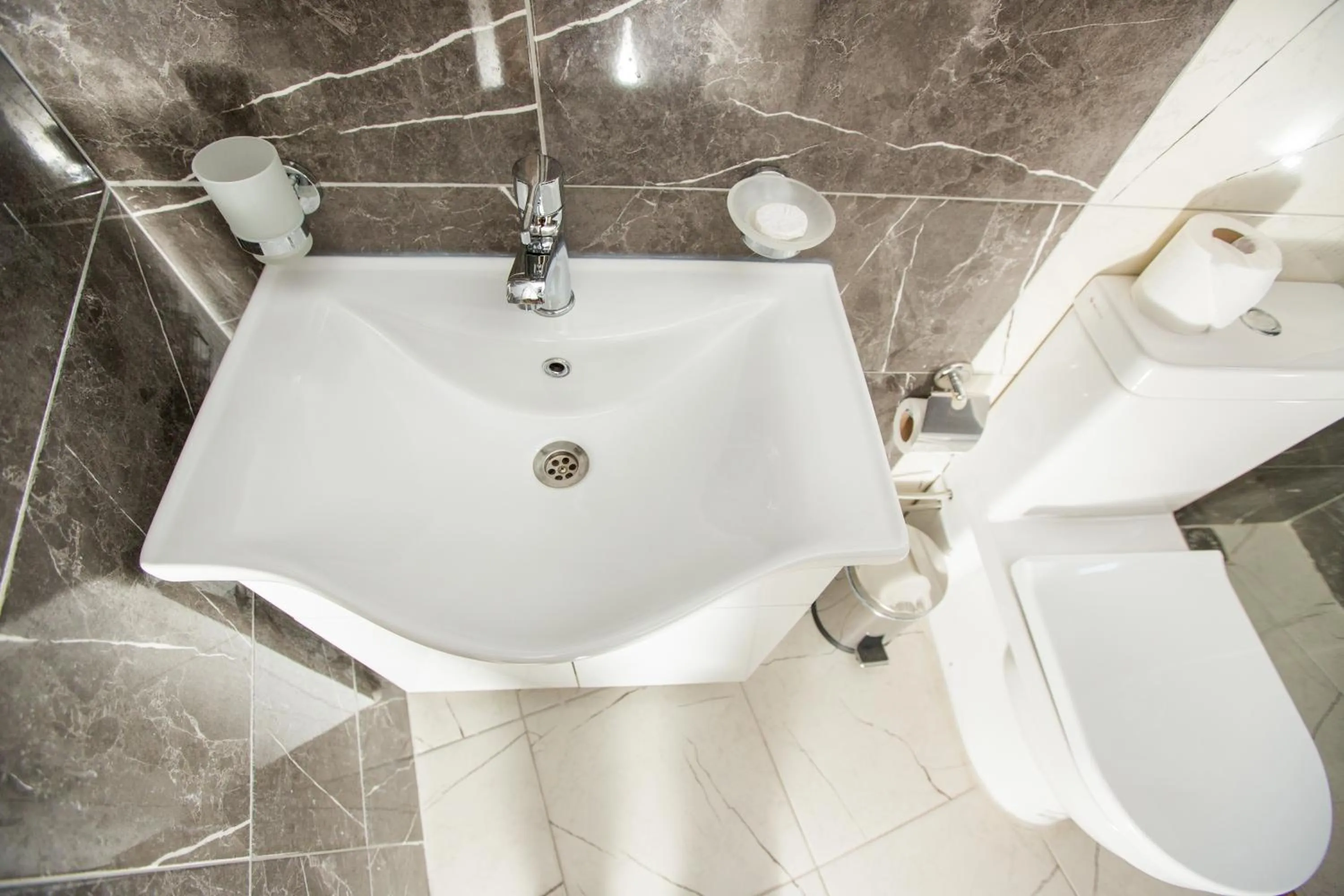 Toilet in Corner Garden Hotel