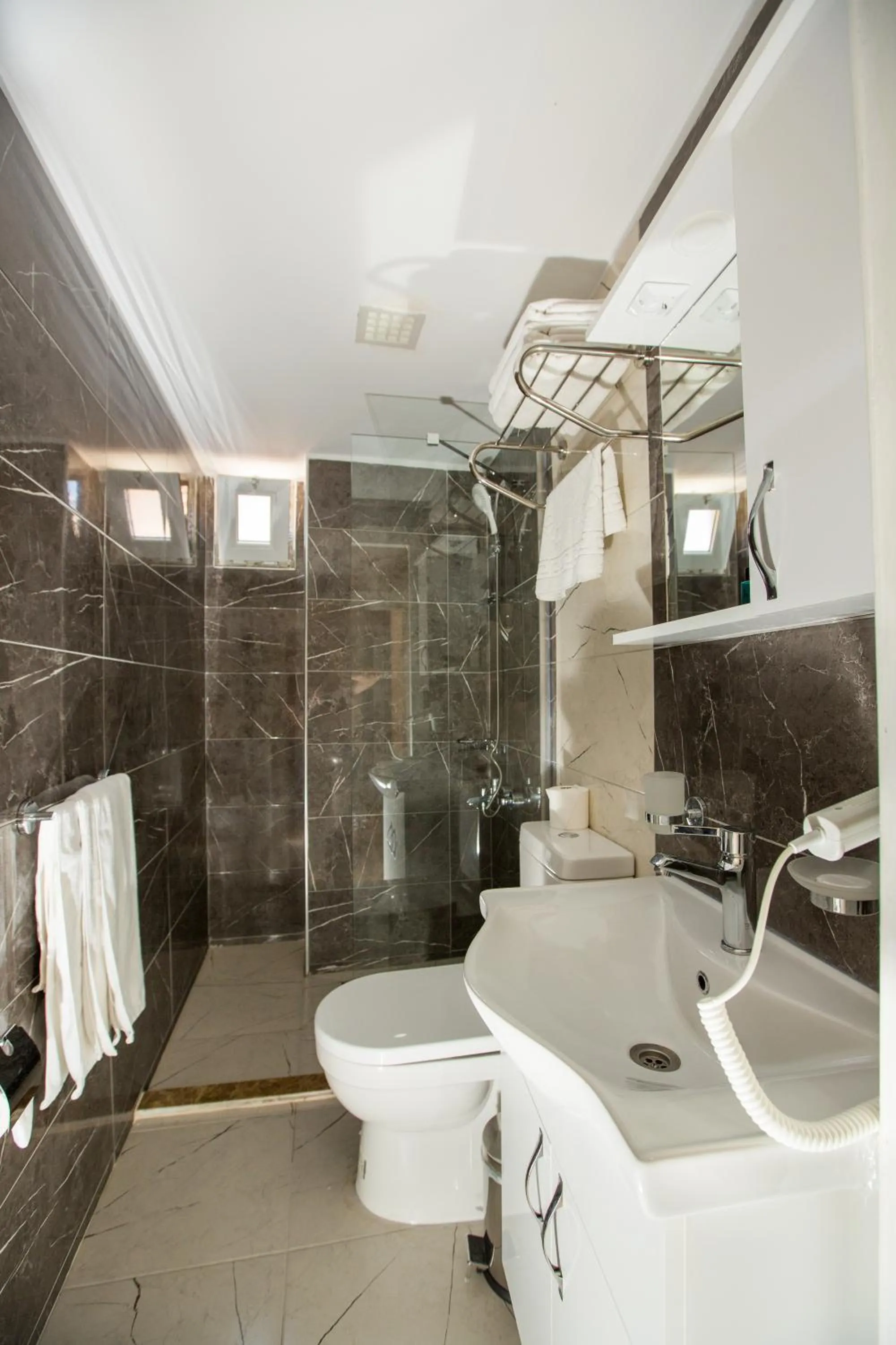 Shower in Corner Garden Hotel