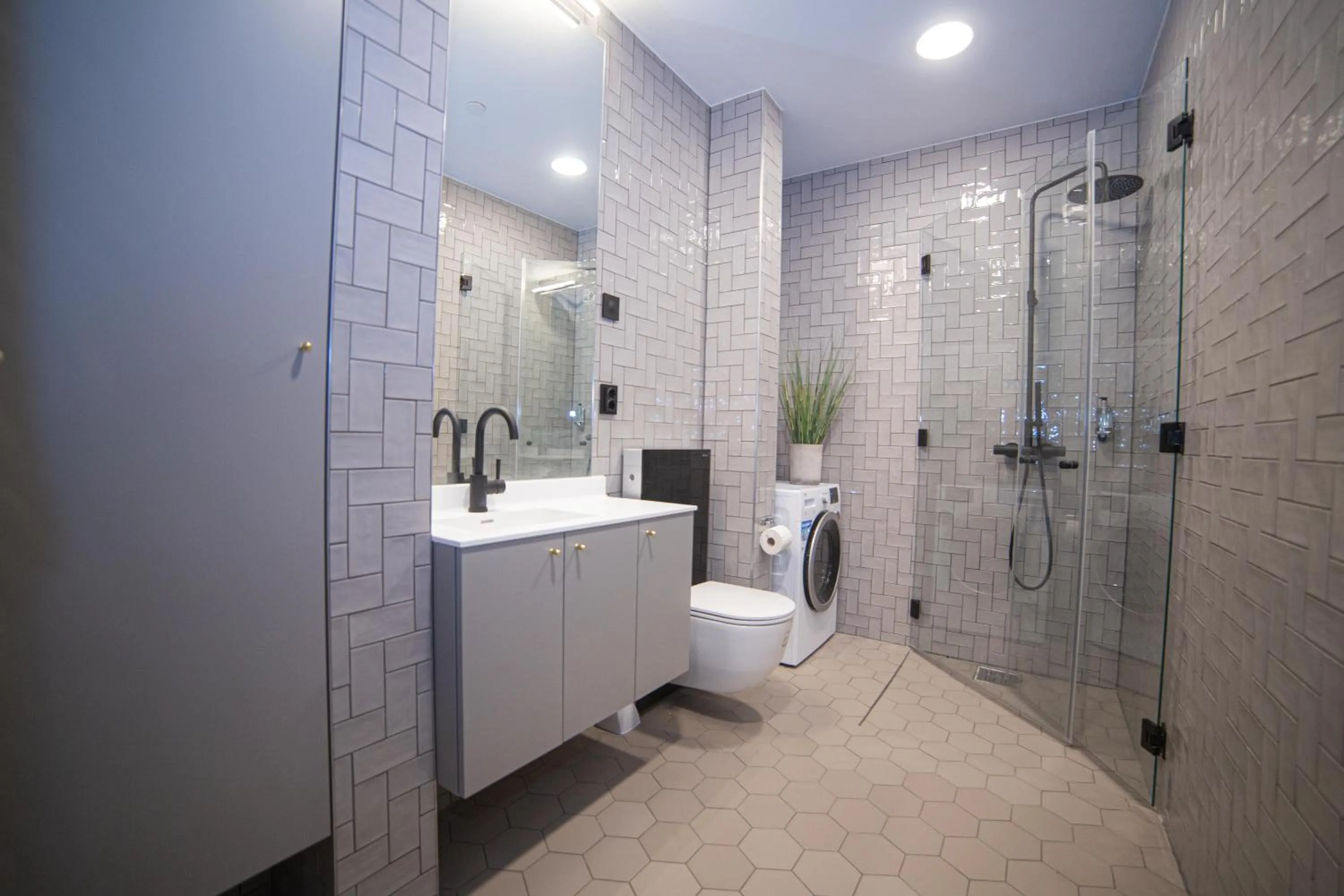 Bathroom in Home Again Apartments Kirkegata