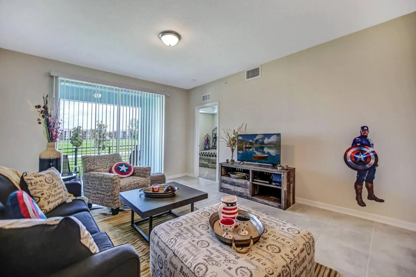 Living room in H - New 2 Bedroom Condo - 5 Miles to Disney - Free Water Park