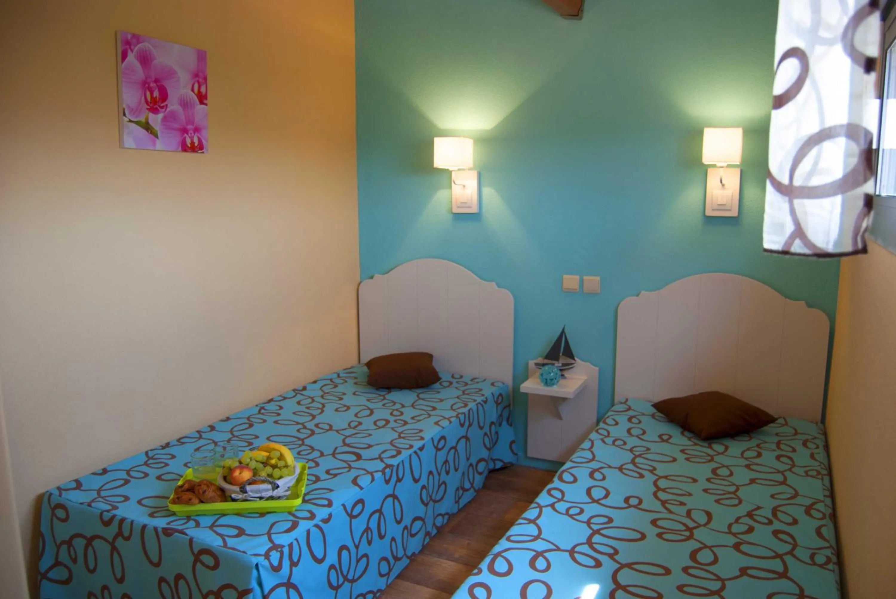 Bedroom, Bed in Lagrange Grand Bleu Vacances – Résidence Les Jardins de Neptune