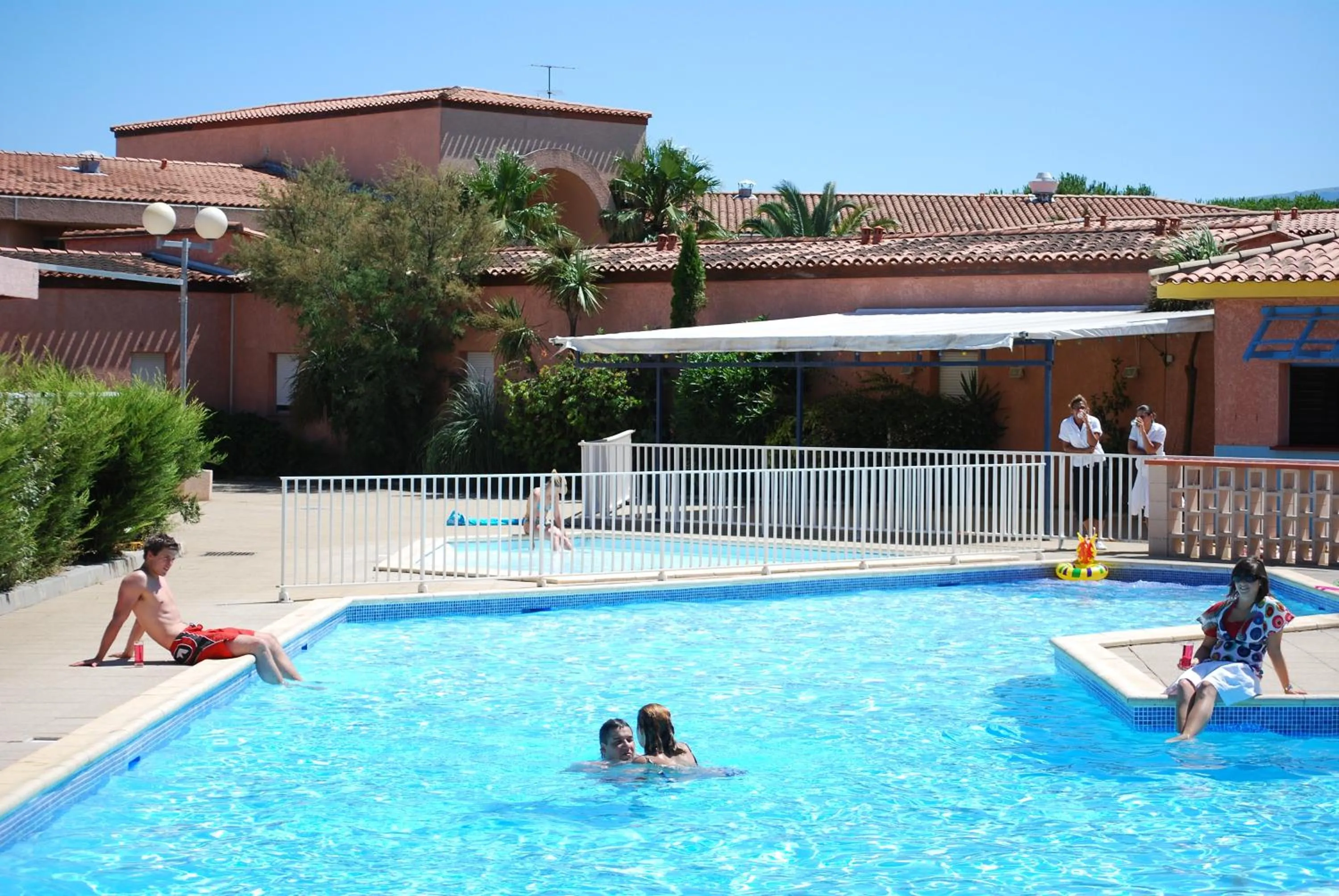 Swimming pool in Lagrange Grand Bleu Vacances – Résidence Les Jardins de Neptune