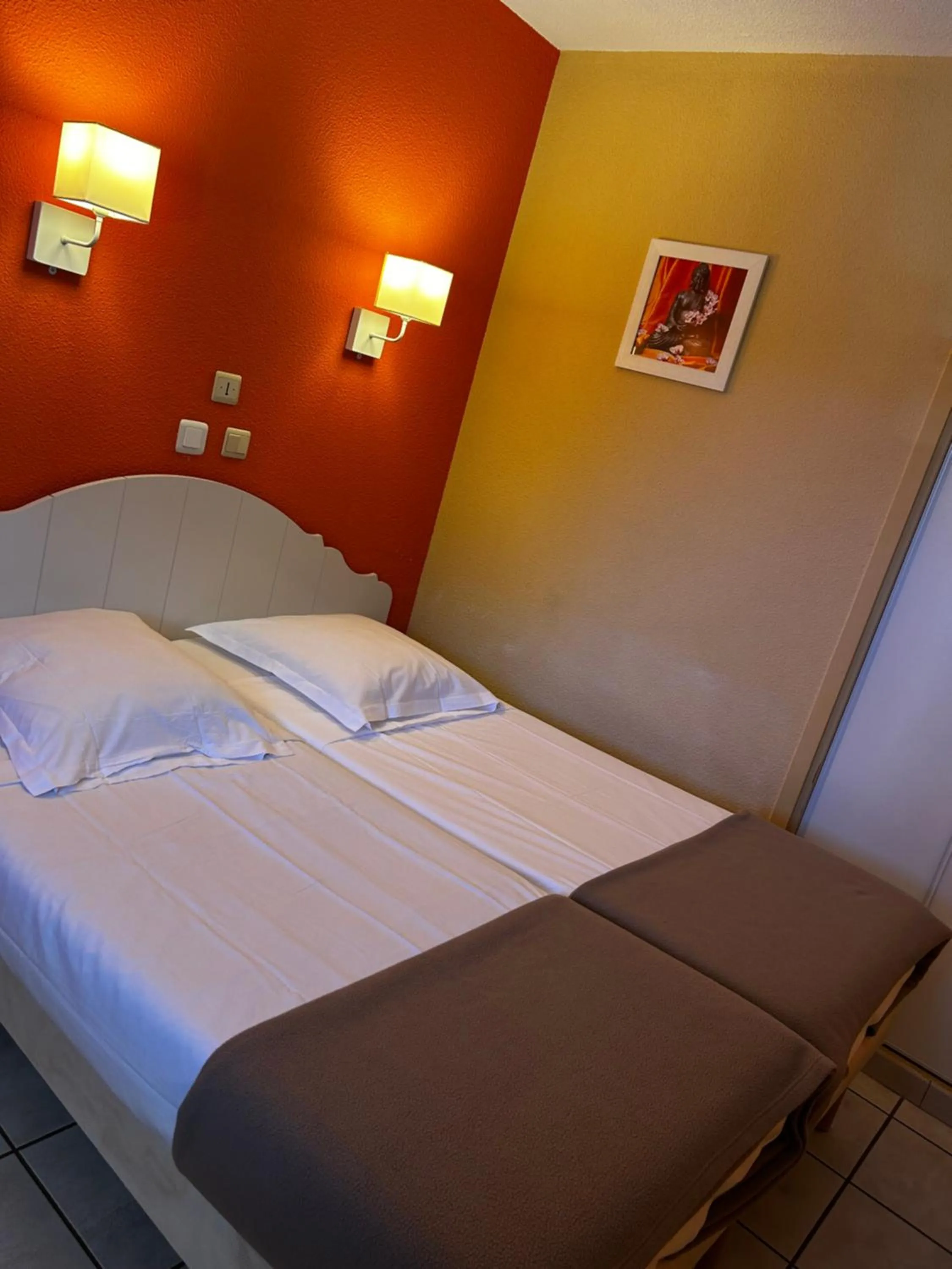 Bed in Lagrange Grand Bleu Vacances – Résidence Les Jardins de Neptune