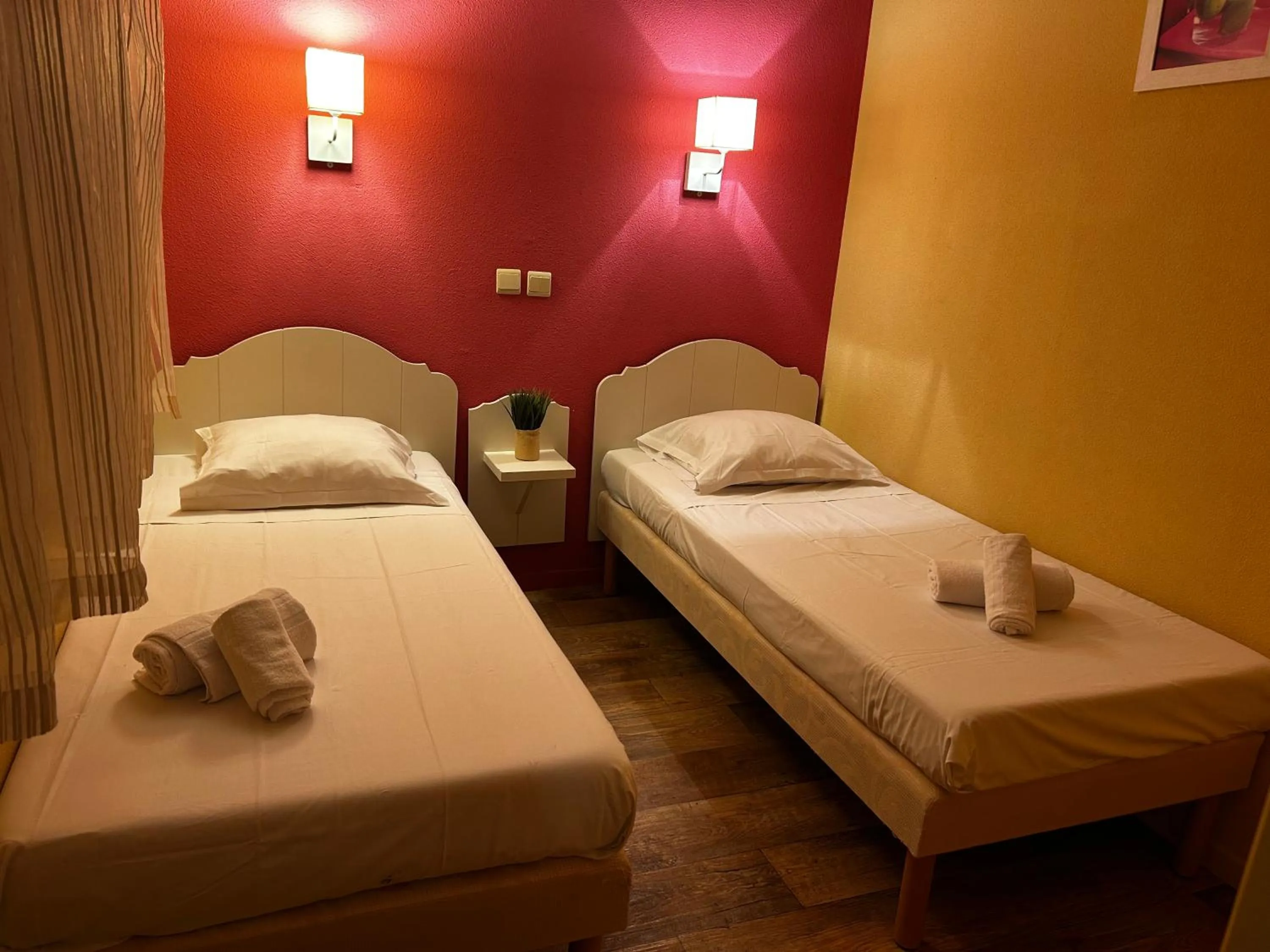 Bed in Lagrange Grand Bleu Vacances – Résidence Les Jardins de Neptune