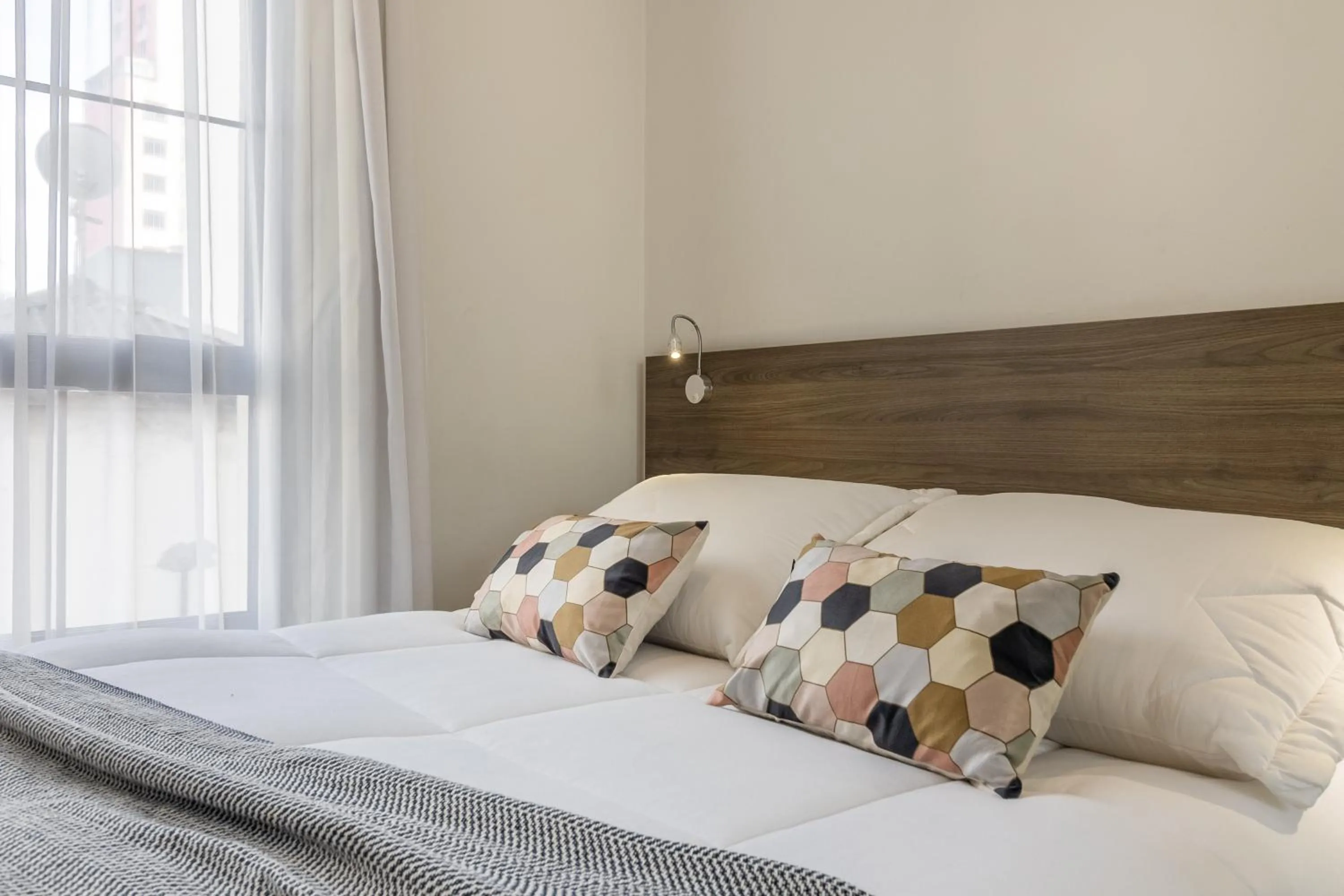 Bed in Jacques Pilon Residence