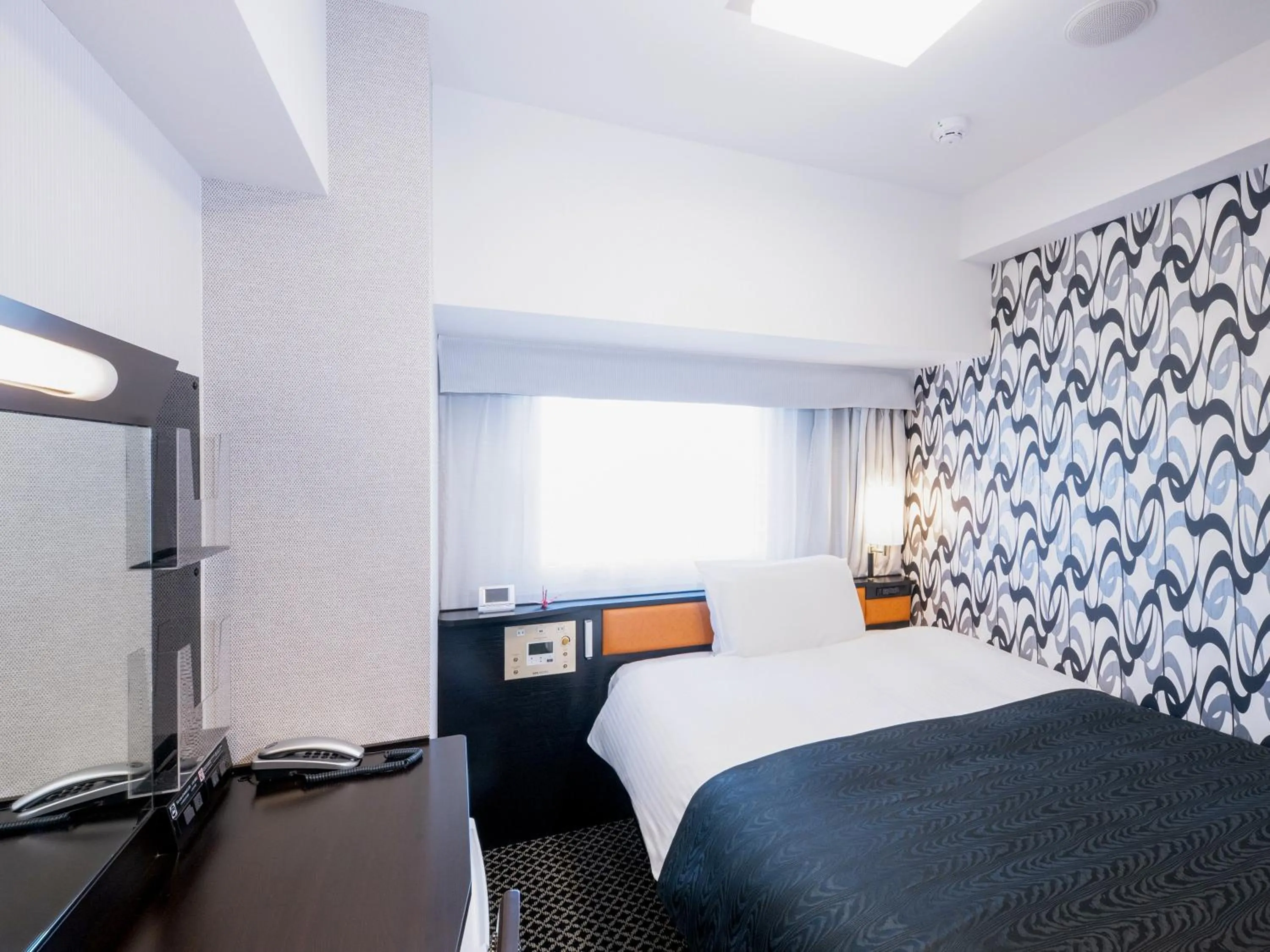 Bed in APA Hotel Yamanote Otsuka Ekimae Tower