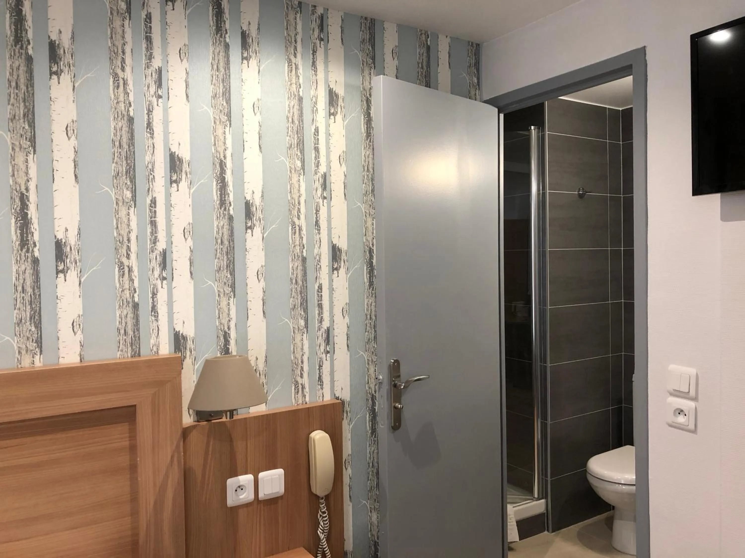 Bedroom in Hôtel Alane