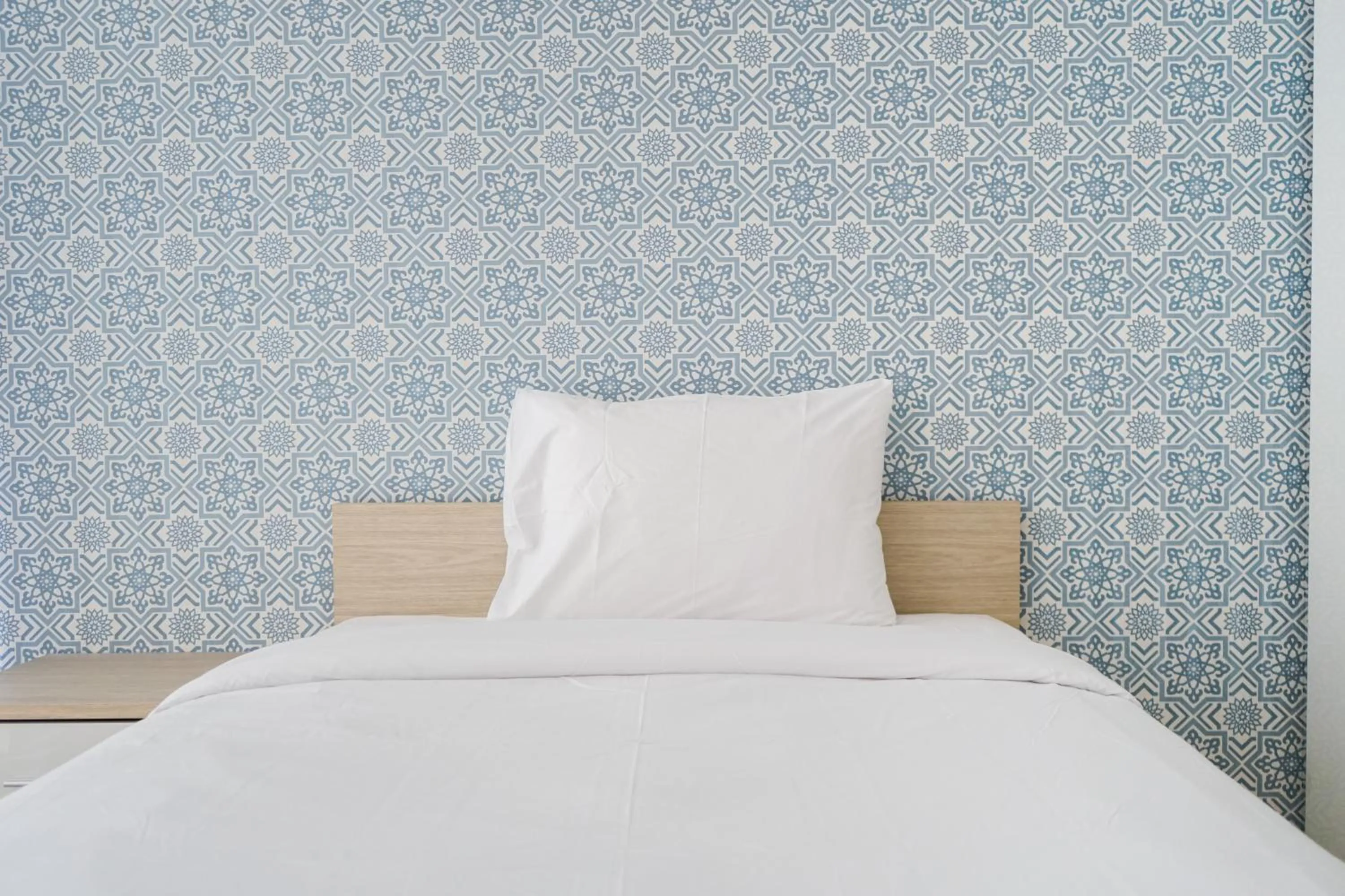 Bed in South Tower 2BR at L'Avenue Apartment By Travelio