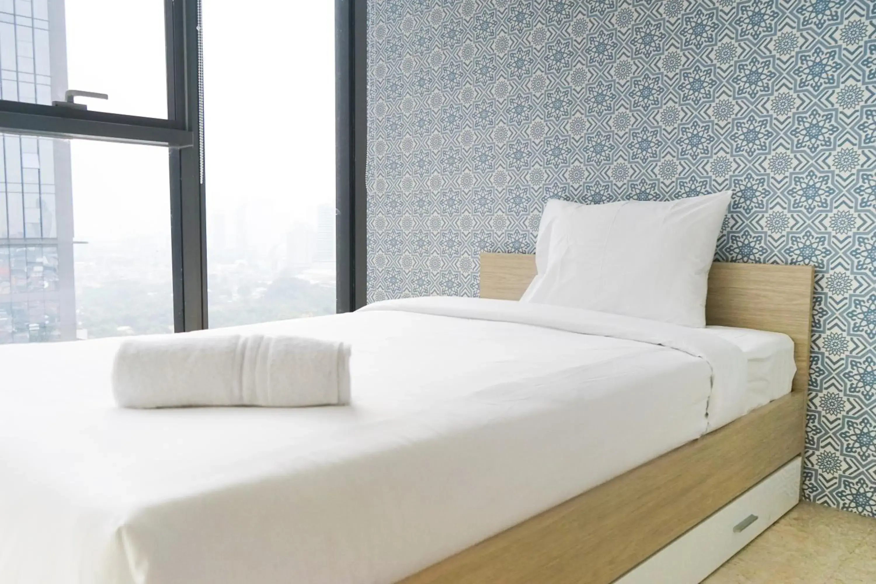 Bedroom, Bed in South Tower 2BR at L'Avenue Apartment By Travelio Bedroom, Bed in South Tower 2BR at L'Avenue Apartment By Travelio