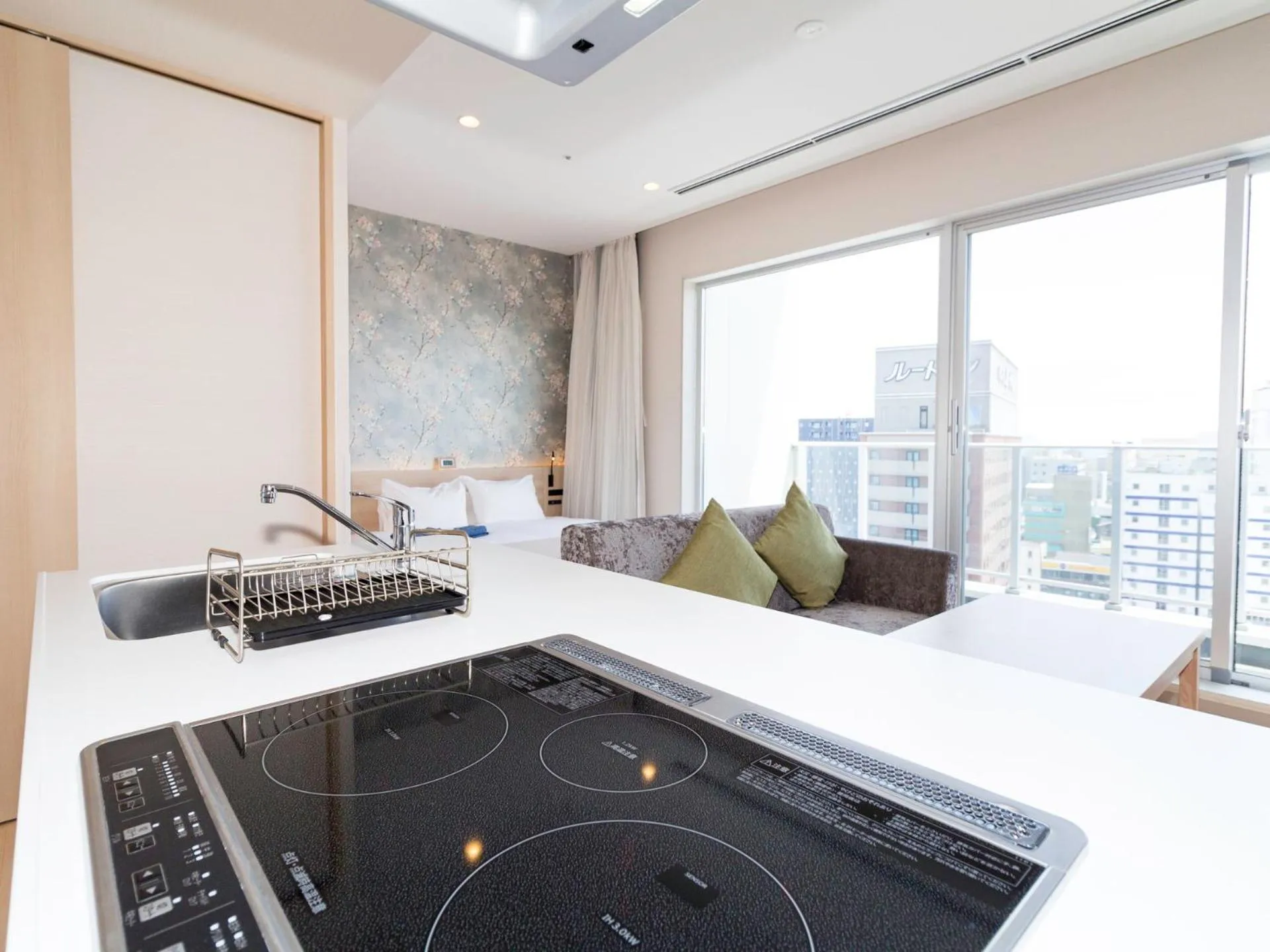 Kitchen or kitchenette, Bed in La'gent Stay Hakodate Ekimae