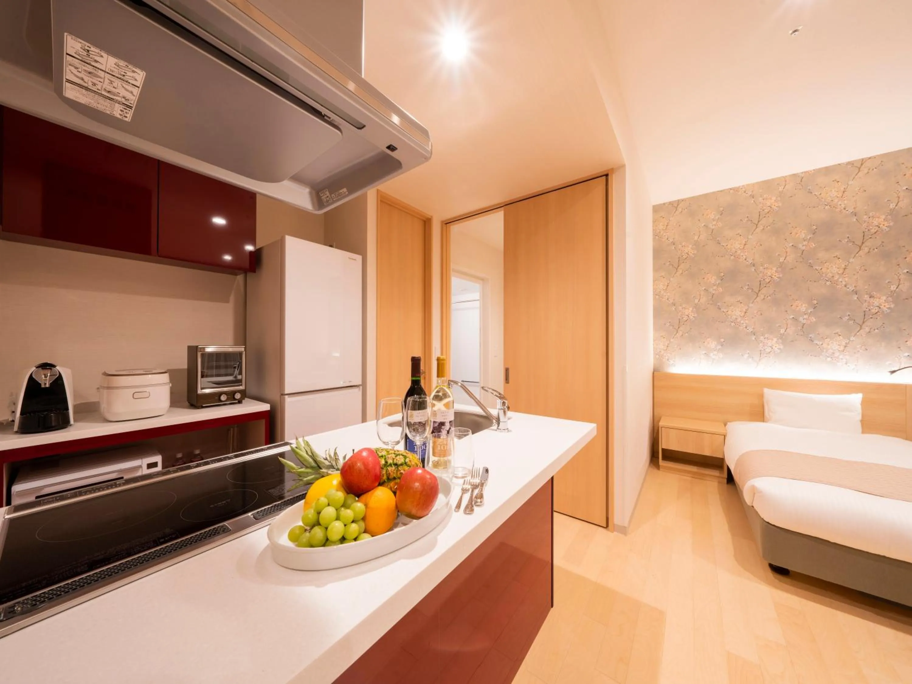 Kitchen or kitchenette, Bed in La'gent Stay Hakodate Ekimae