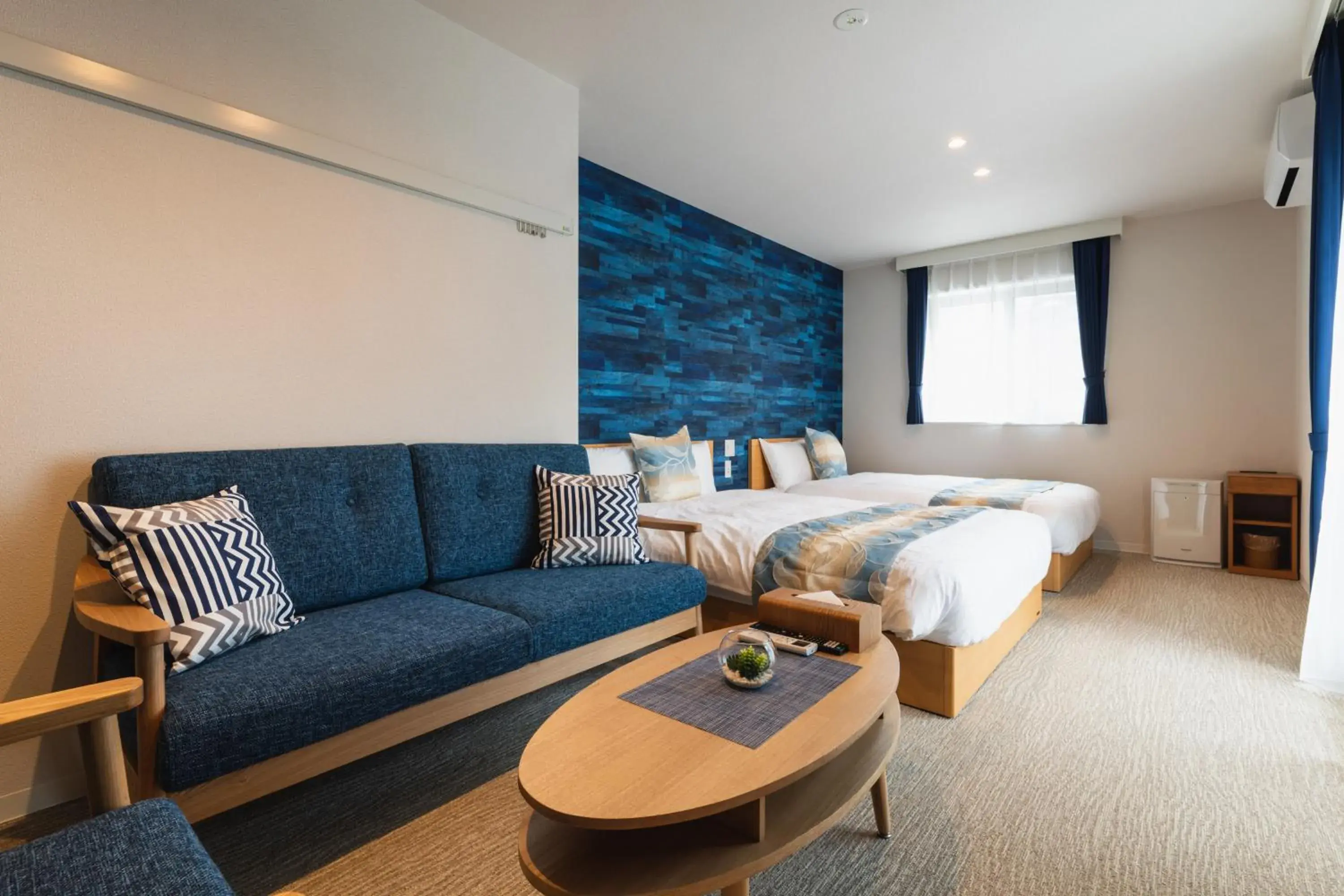 Living room, Bed in GRAND BASE Mojiko Living room, Bed in GRAND BASE Mojiko