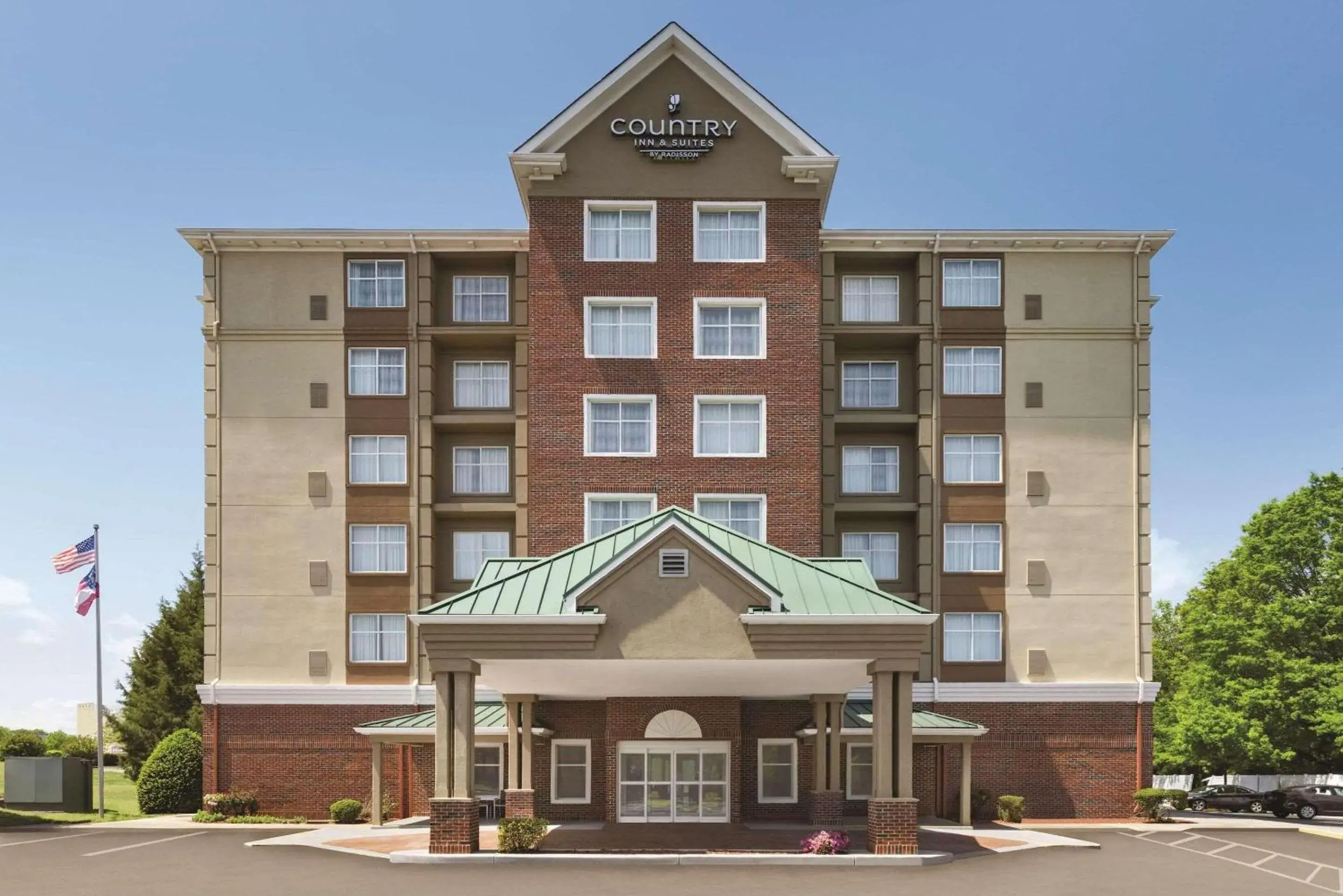 Property building in Country Inn & Suites by Radisson, Conyers, GA Property building in Country Inn & Suites by Radisson, Conyers, GA