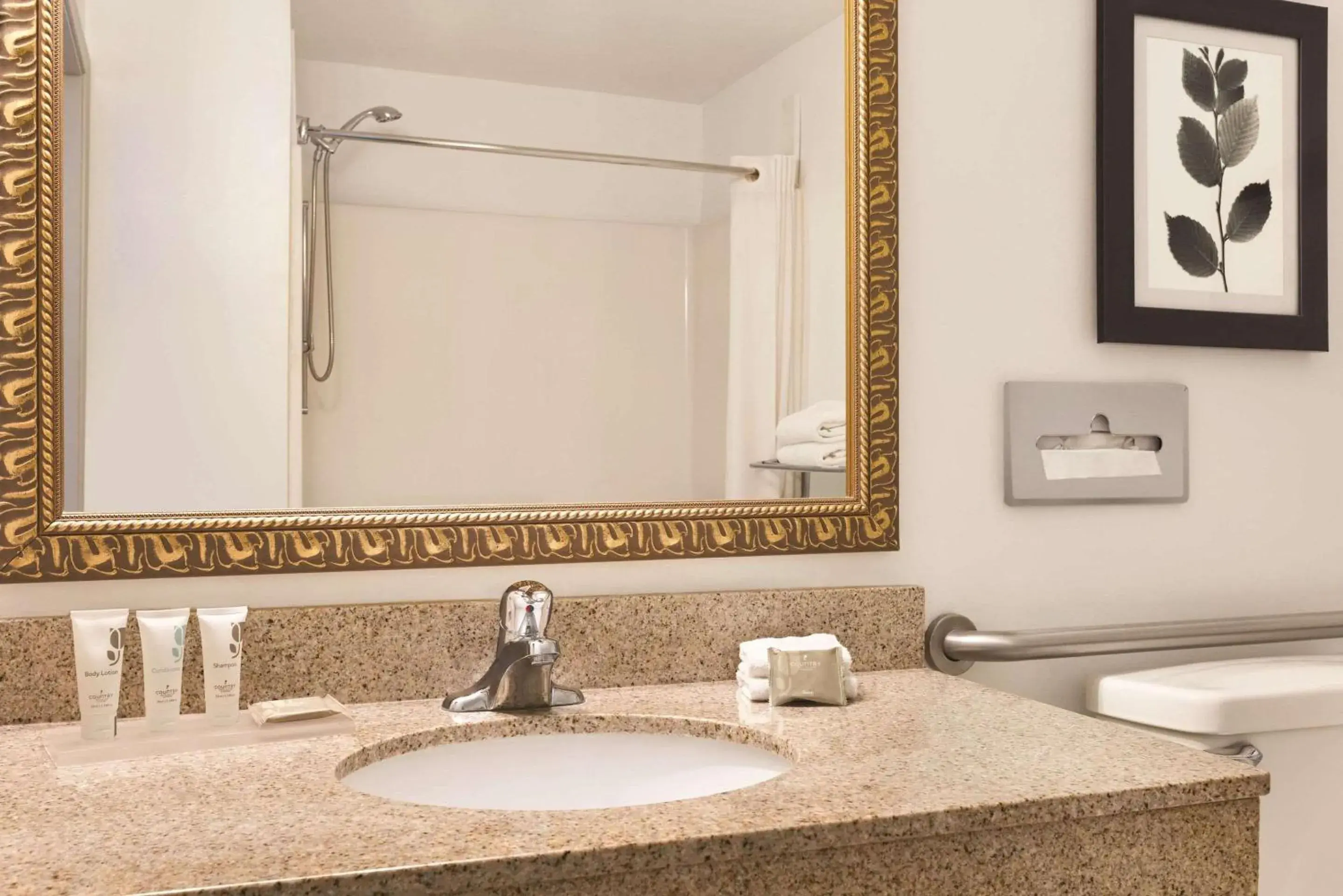 Bathroom in Country Inn & Suites by Radisson, Conyers, GA Bathroom in Country Inn & Suites by Radisson, Conyers, GA