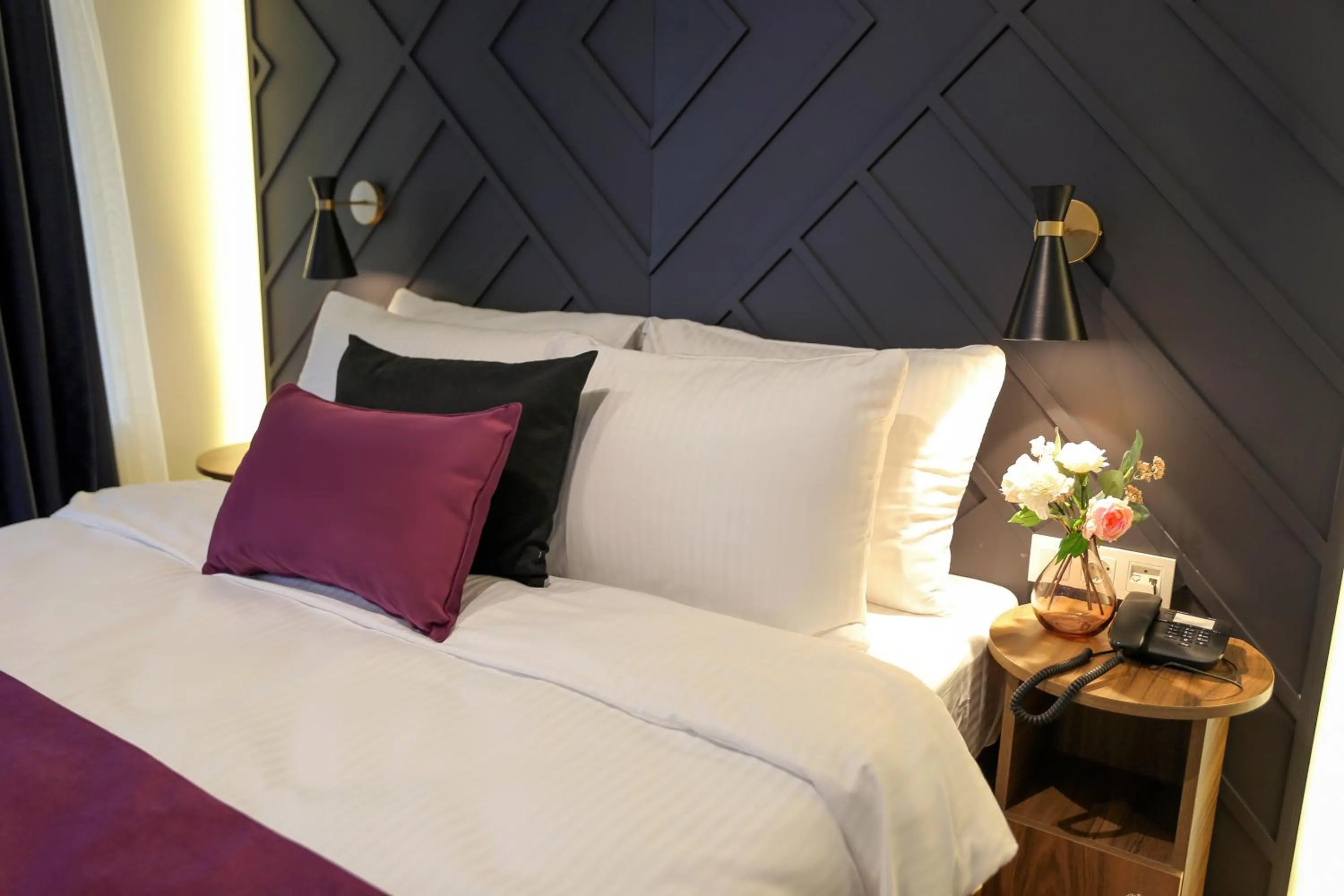 Bed in The Roomy Hotel Şişli