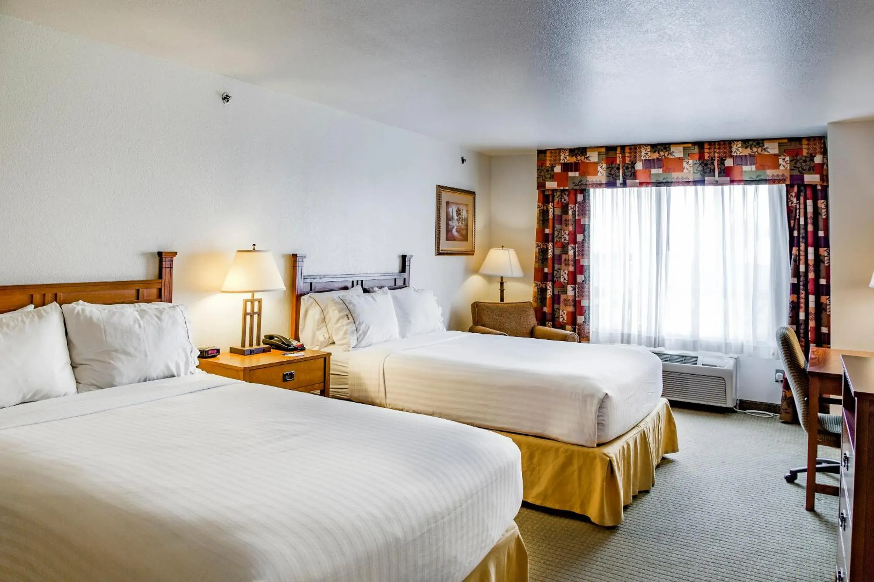 Bedroom in Holiday Inn Express & Suites Jacksonville by IHG Bedroom in Holiday Inn Express & Suites Jacksonville by IHG