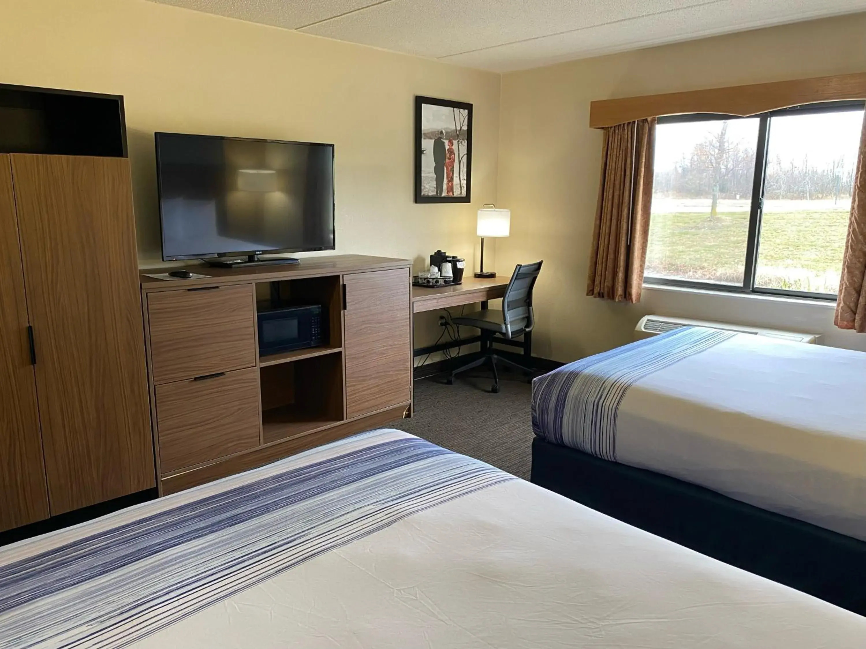 Queen Room with Two Queen Beds - Non-Smoking in AmericInn by Wyndham Greenville Queen Room with Two Queen Beds - Non-Smoking in AmericInn by Wyndham Greenville