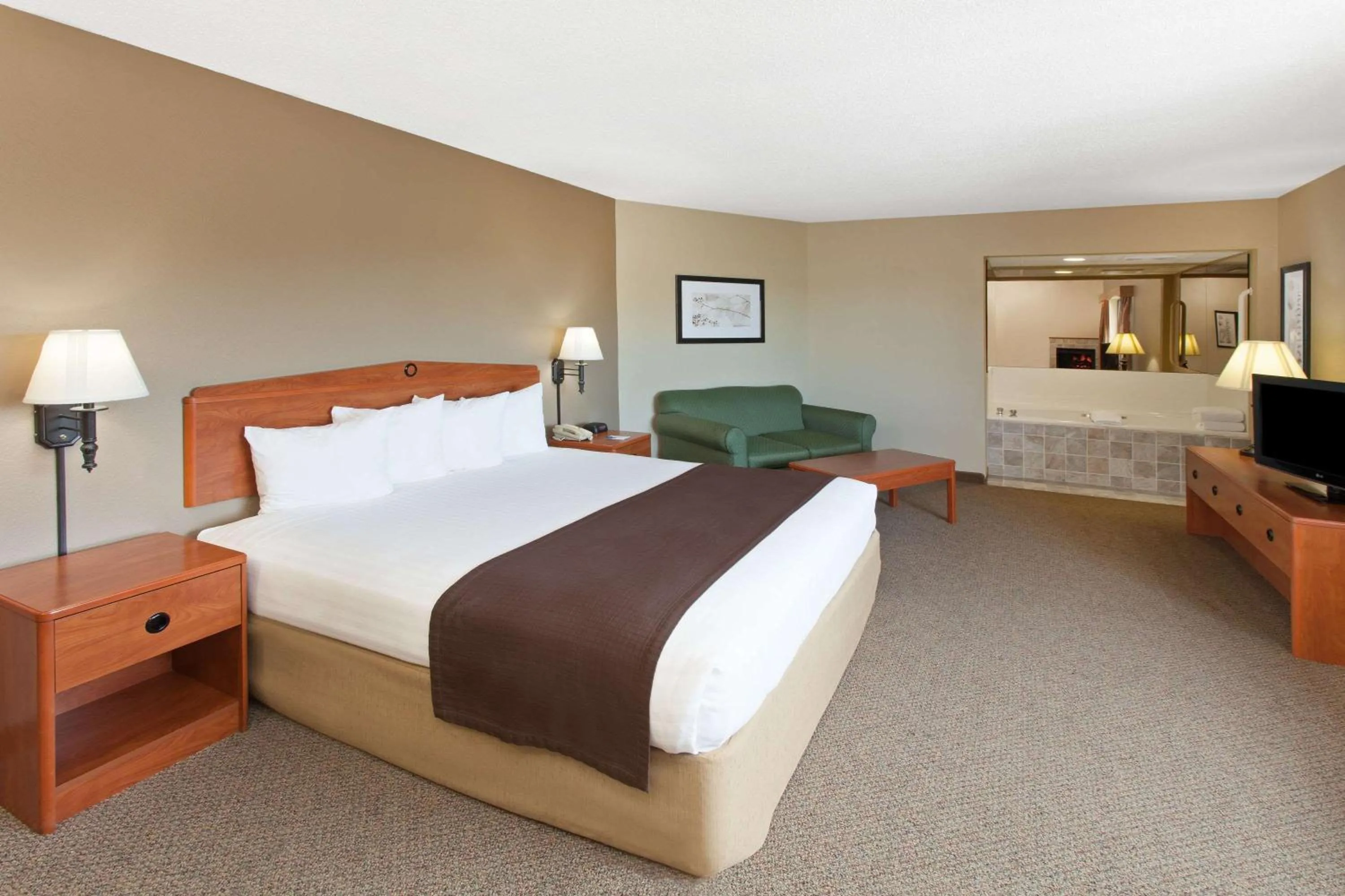 Photo of the whole room, Bed in AmericInn by Wyndham Greenville