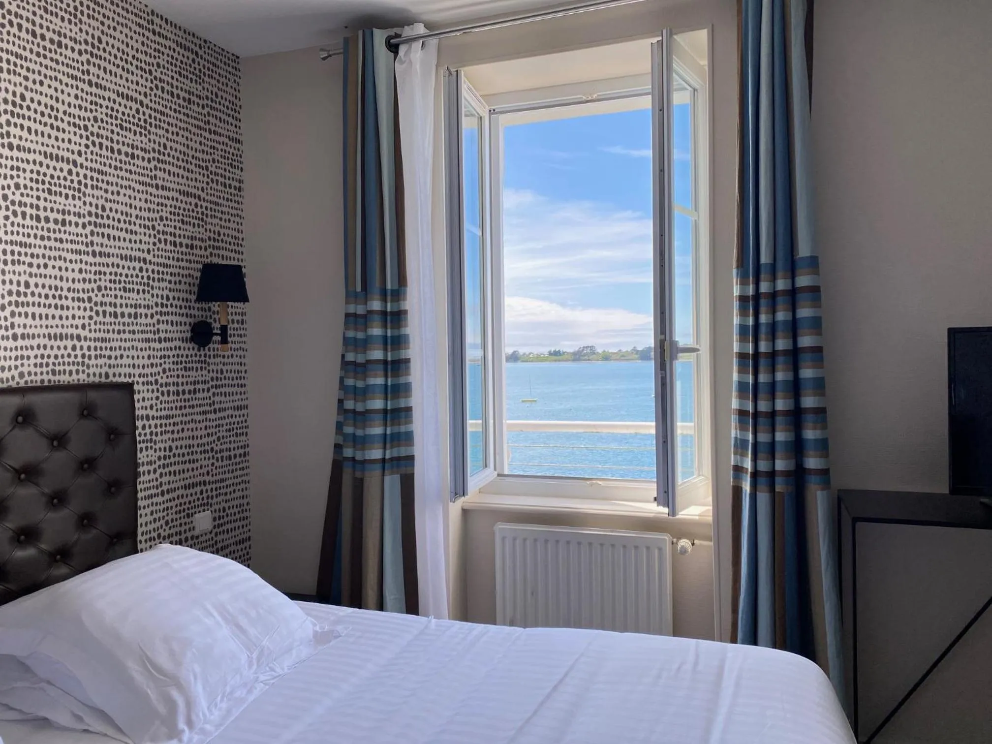 Photo of the whole room, Bed in Hôtel La Baie des Anges, son SPA marin & sa piscine couverte et chauffée