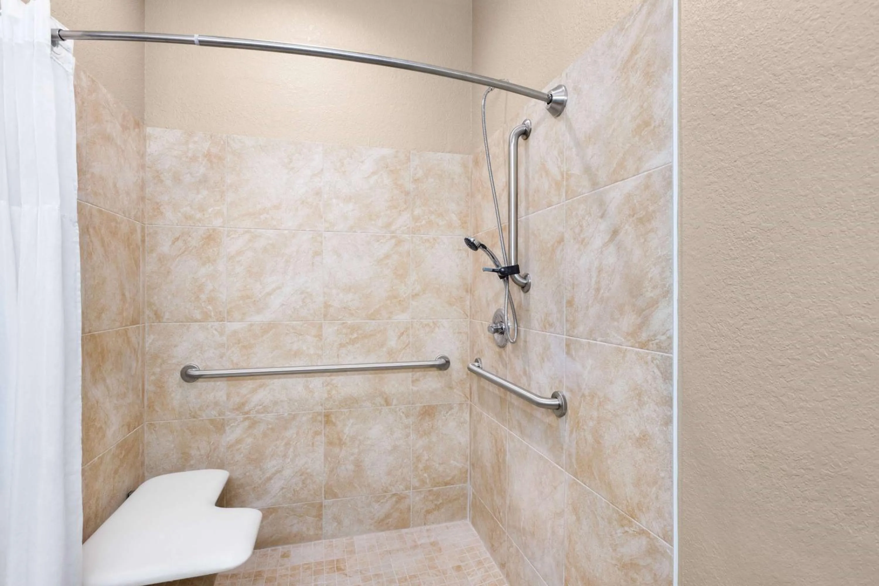 Shower in Microtel Inn & Suites by Wyndham Woodstock/Atlanta North