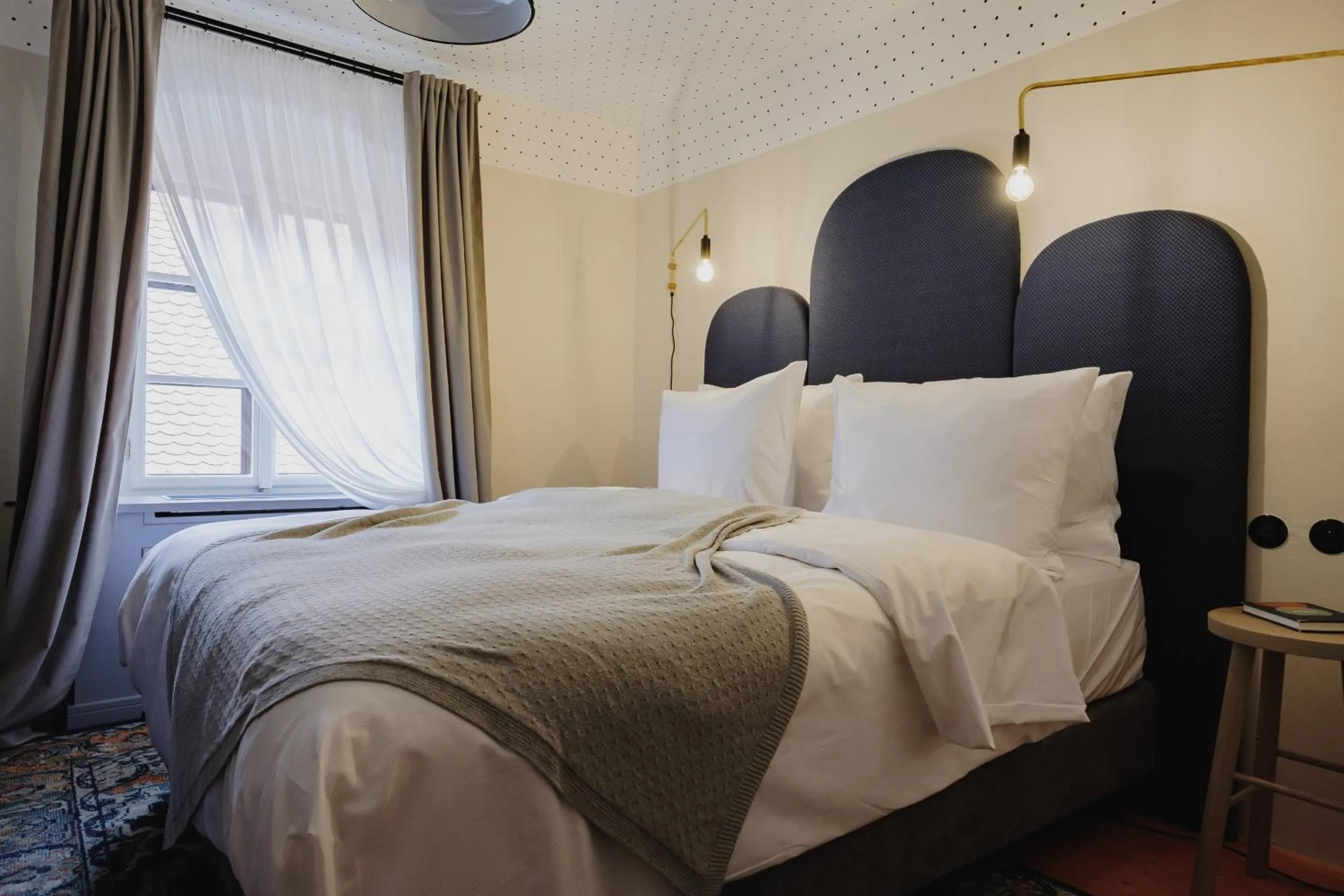 Bed in Monastery Garden Bistro & Rooms