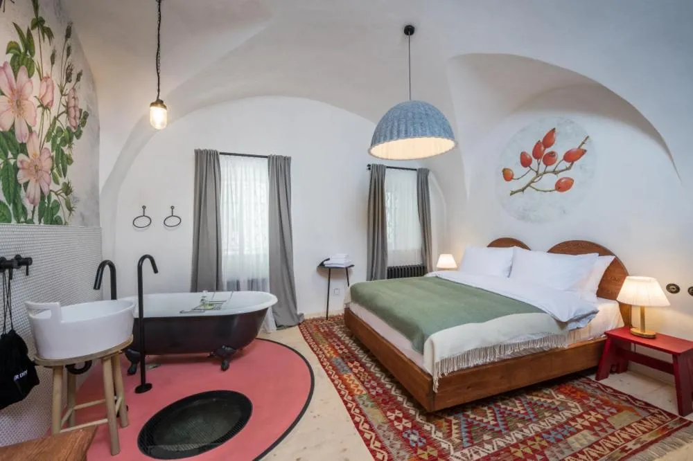 Bed in Monastery Garden Bistro & Rooms