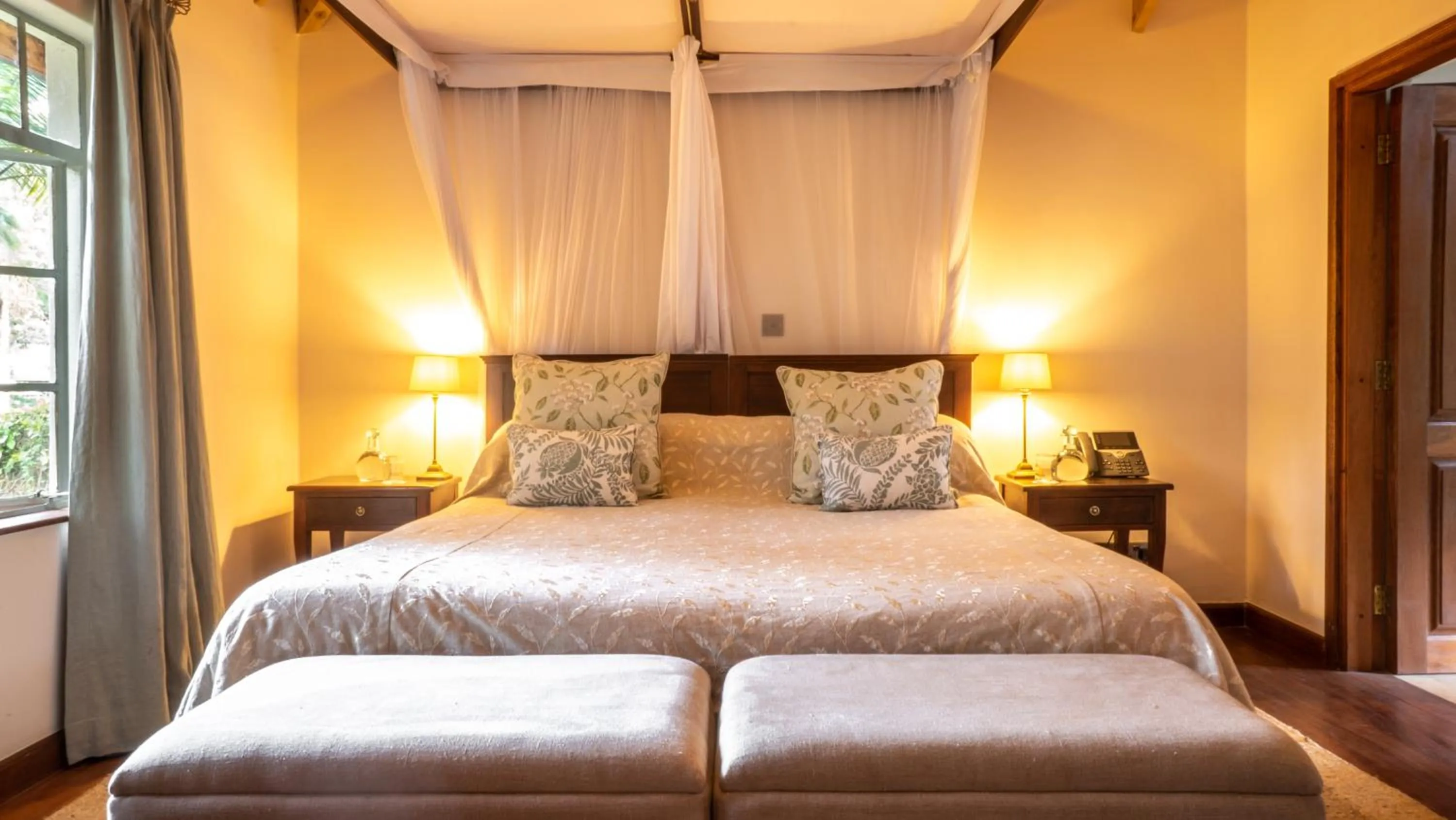 Bed in Karen Blixen Coffee Garden & Cottages