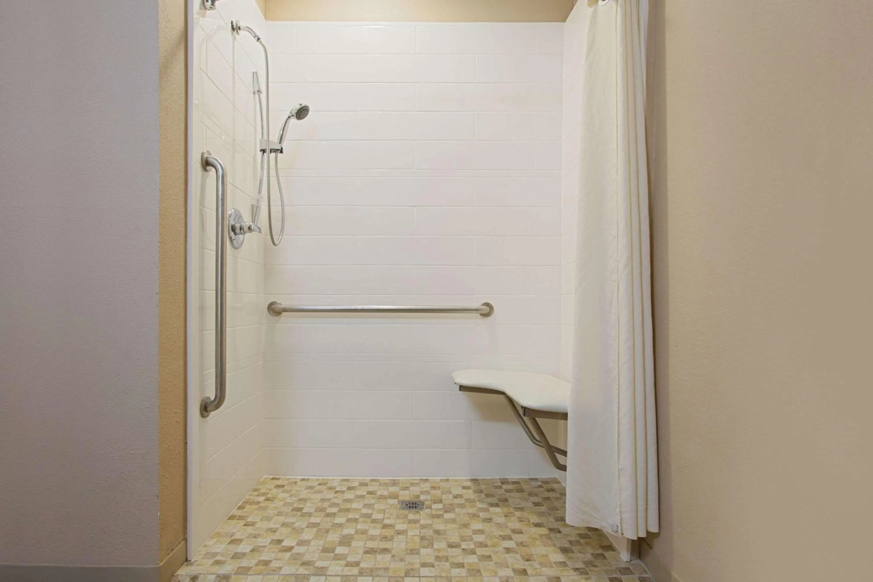 Shower in Microtel Inn & Suites by Wyndham Walterboro