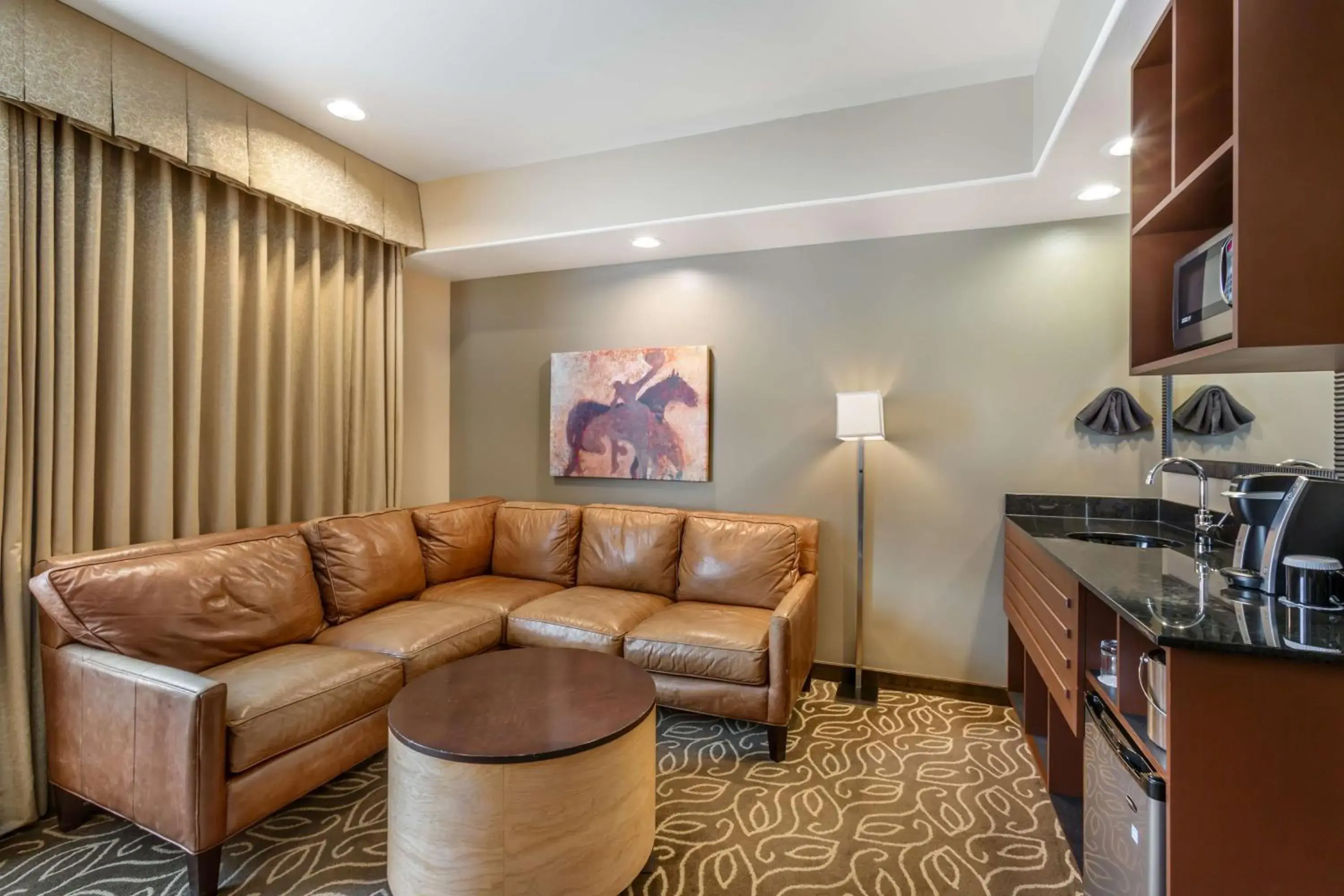 Bedroom in Best Western Premier Ivy Inn & Suites Bedroom in Best Western Premier Ivy Inn & Suites