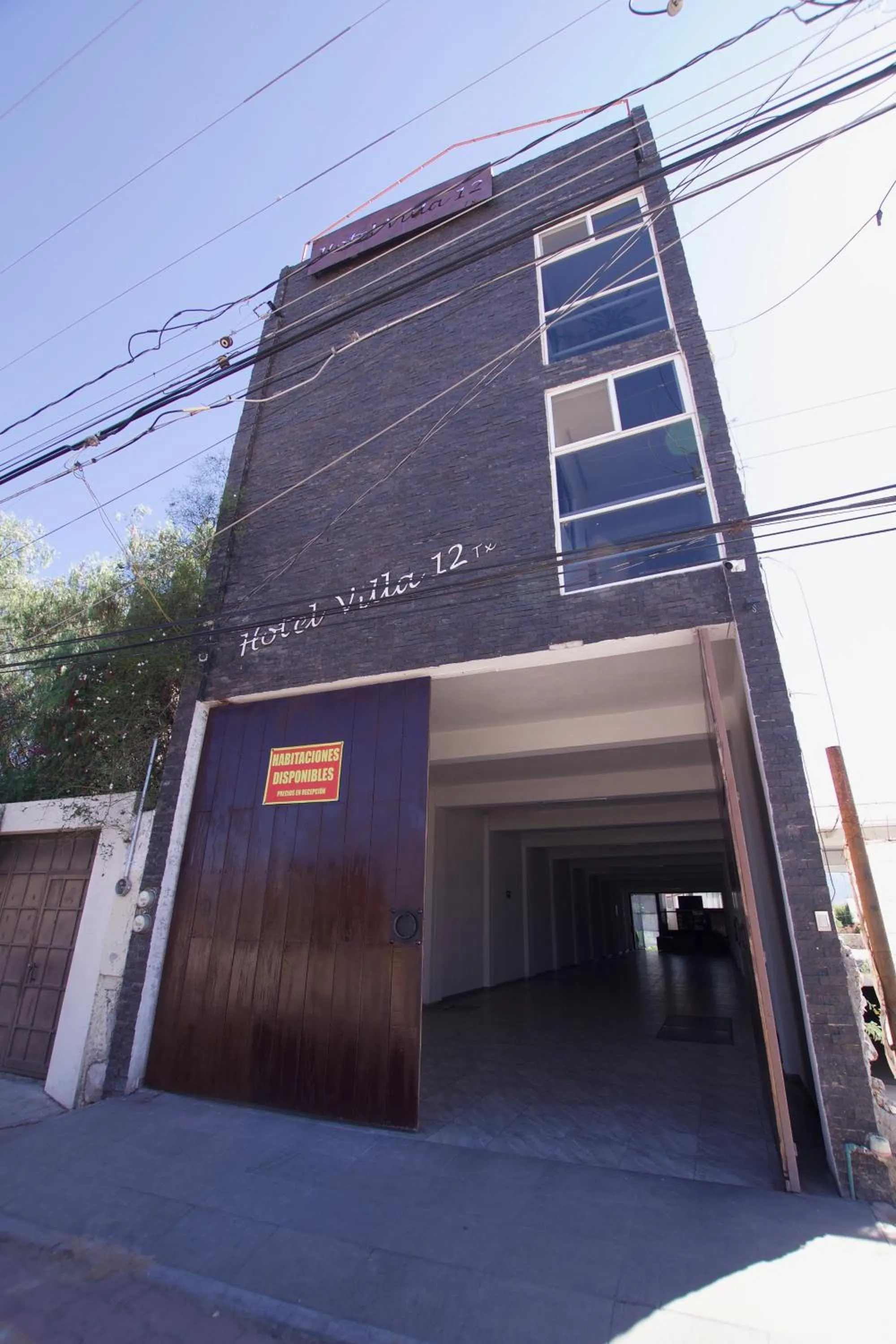 Facade/entrance in Hotel Villa 12 TX