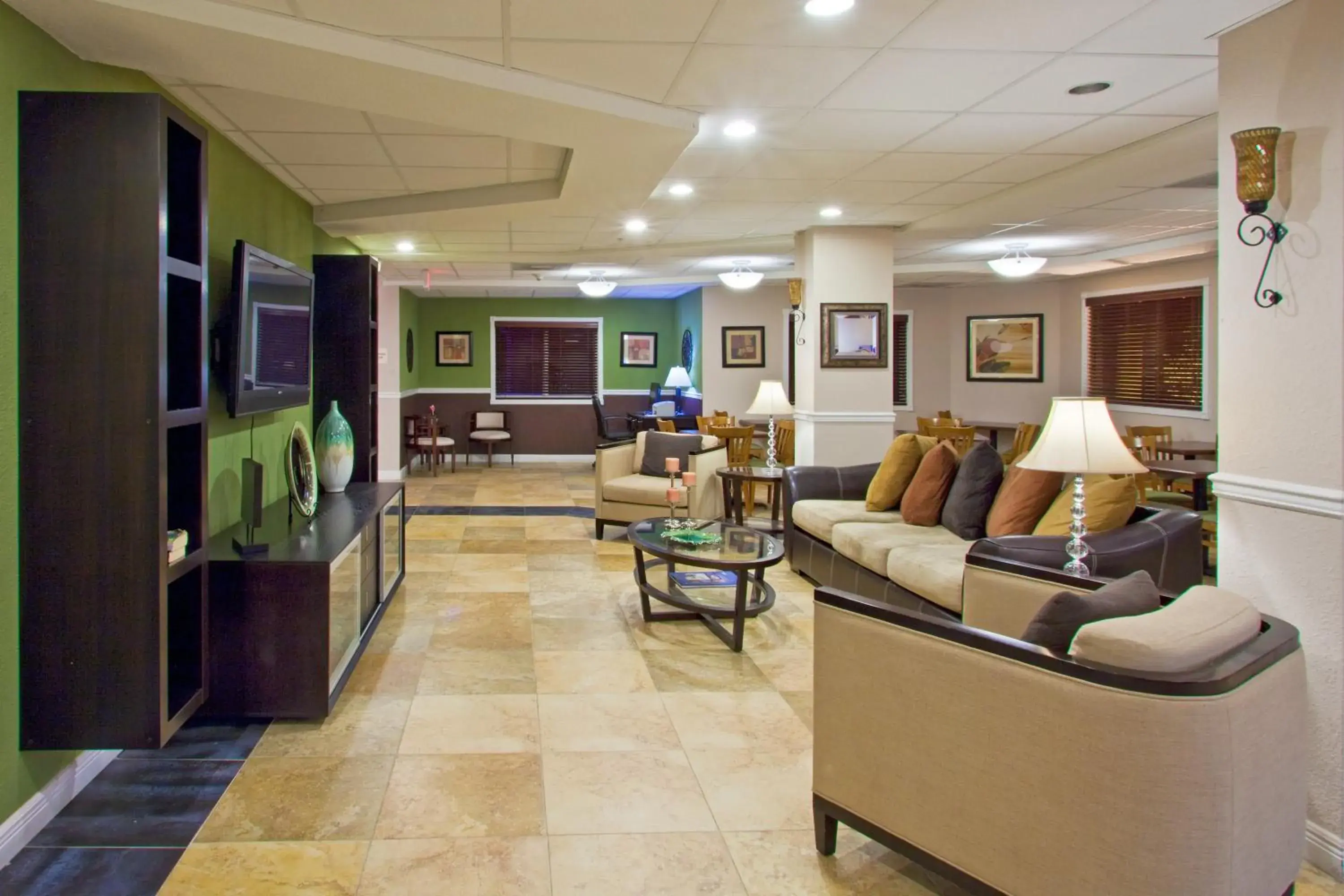 Lobby or reception in Holiday Inn Express West Palm Beach Metrocentre by IHG Lobby or reception in Holiday Inn Express West Palm Beach Metrocentre by IHG