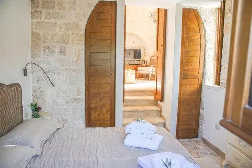 Bed in Trullo Grace -Trulli Anti' Charme & Relax