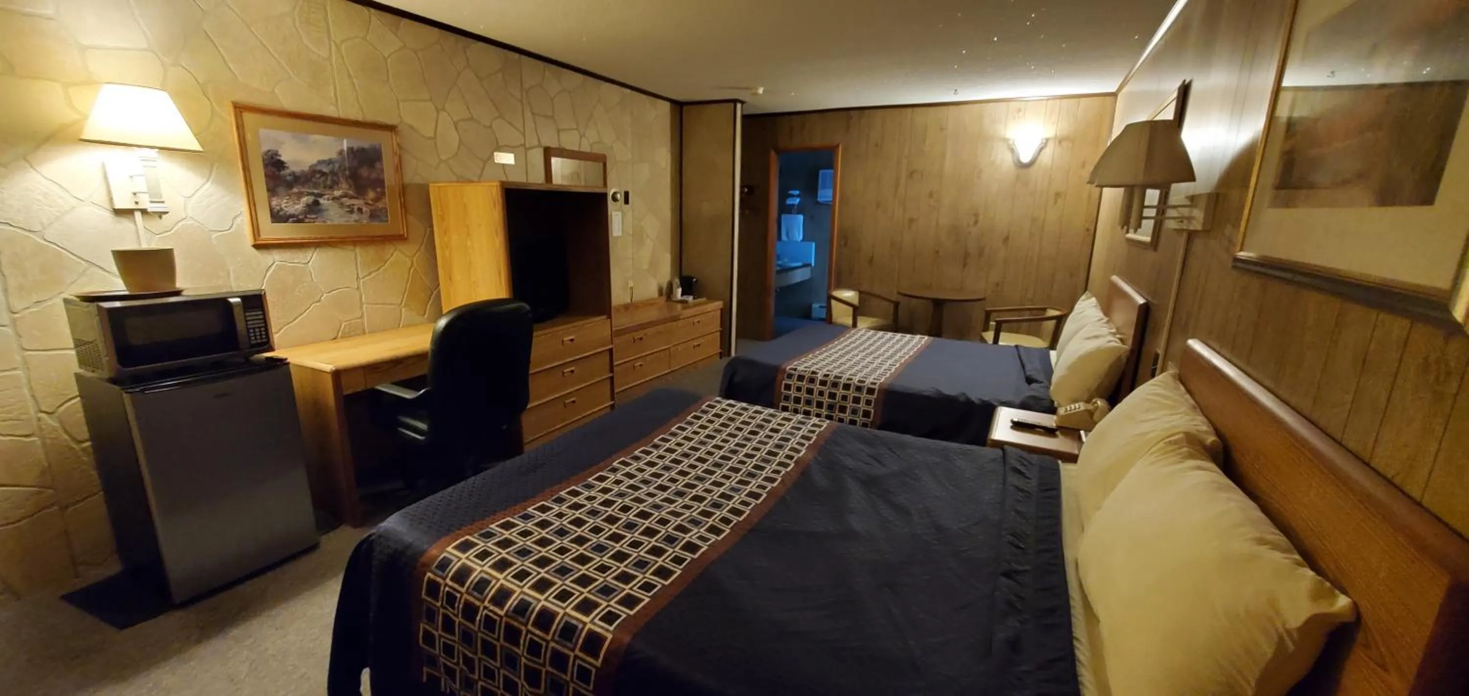 Bed in Red Ranch Inn