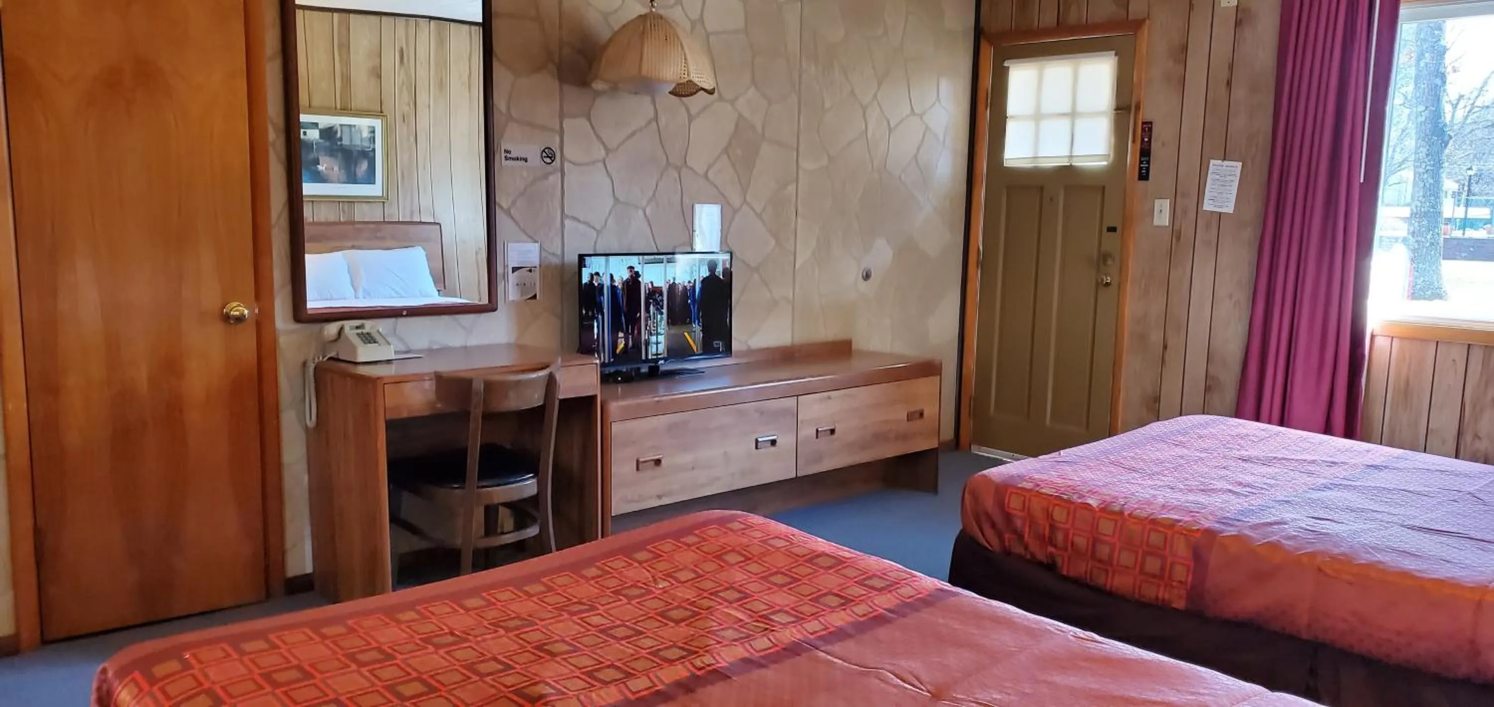 Bed in Red Ranch Inn